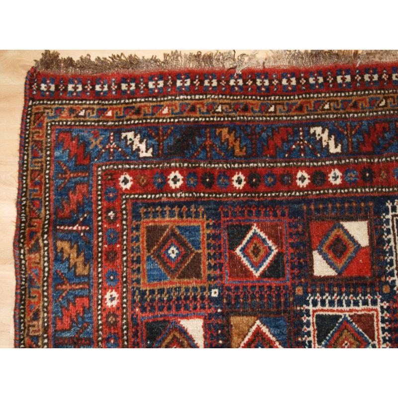 A good Antique Qashqai long rug, with very unusual box design usually found on kilims.

A good Qashqai rug with excellent wool and superb colour. The design is one of the most unusual of all Qashqai designs, note the small animal in the bottom