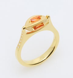 Ring with Orange Sapphire and Diamonds