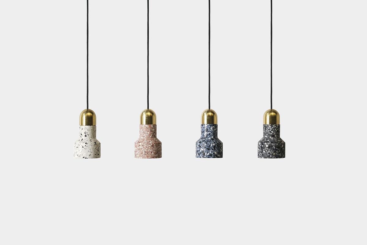 Terrazzo pendant lamps designed by Cantonese studio Bentu Design

Black wire 2m adjustable. Bulb E27 LED 3W
Measures: 17.5 cm x 9.6 cm

These pendant lamps are available in different colors of terrazzo: white, black, red or blue.

Bentu Design's