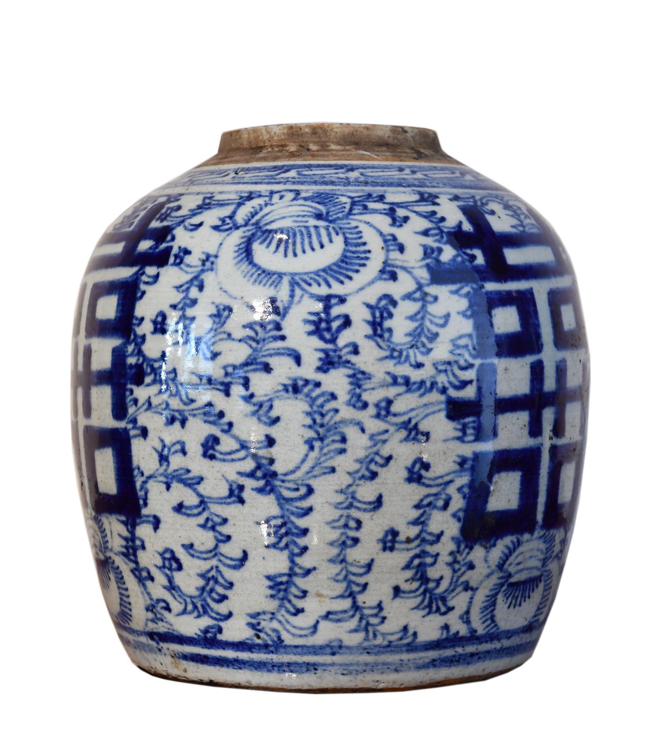 A Qing Chinese porcelain jar with hand-painted cobalt blue decoration of 