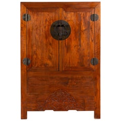 Qing Dynasty 19th Century Armoire with Carved Skirt and Large Medallion