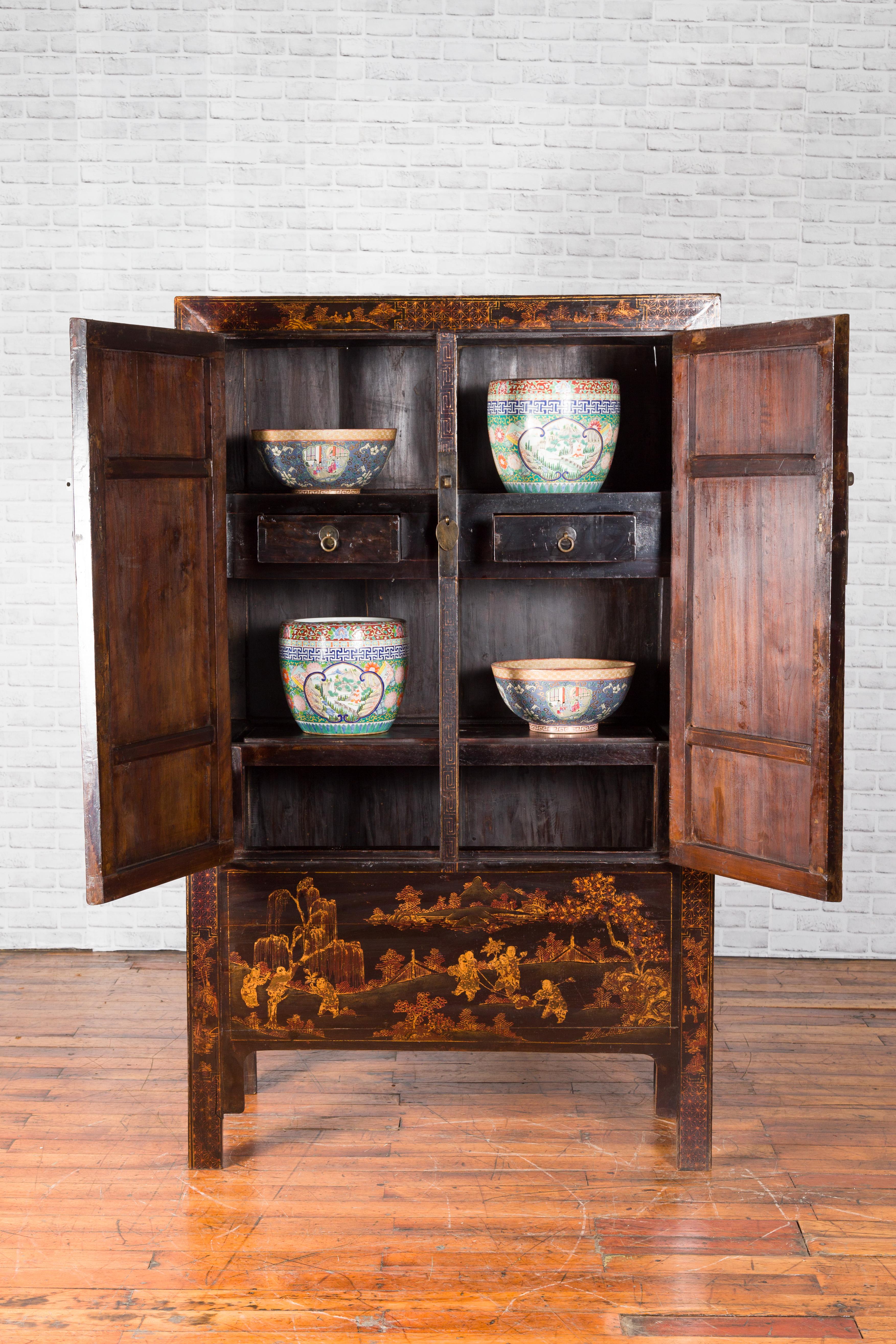 Qing Dynasty 19th Century Black Lacquer Cabinet with Gilt Chinoiserie Decor In Good Condition In Yonkers, NY