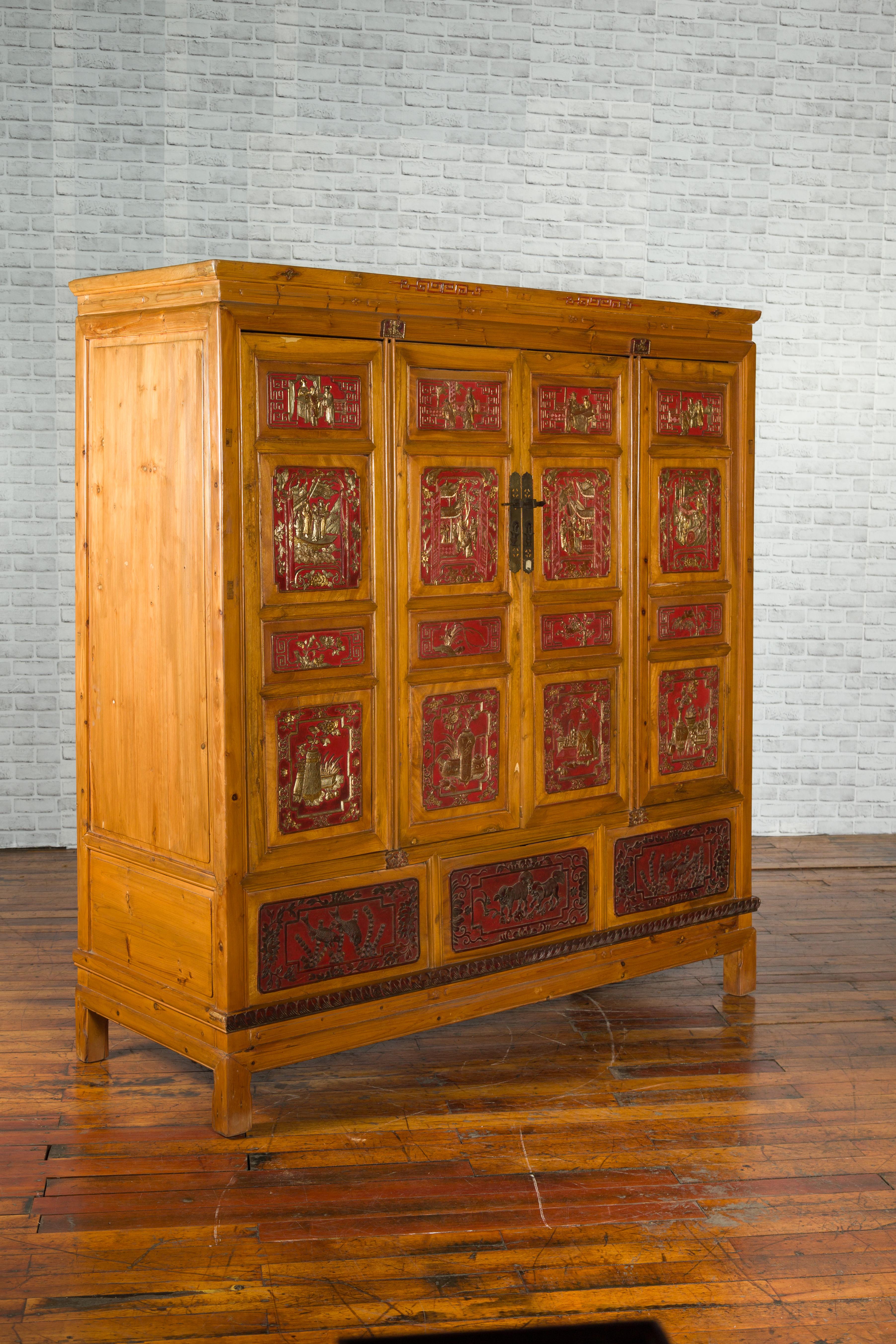 Asian Qing Dynasty 19th Century Chinese Hand Carved Armoire with Gilt Painted Panels