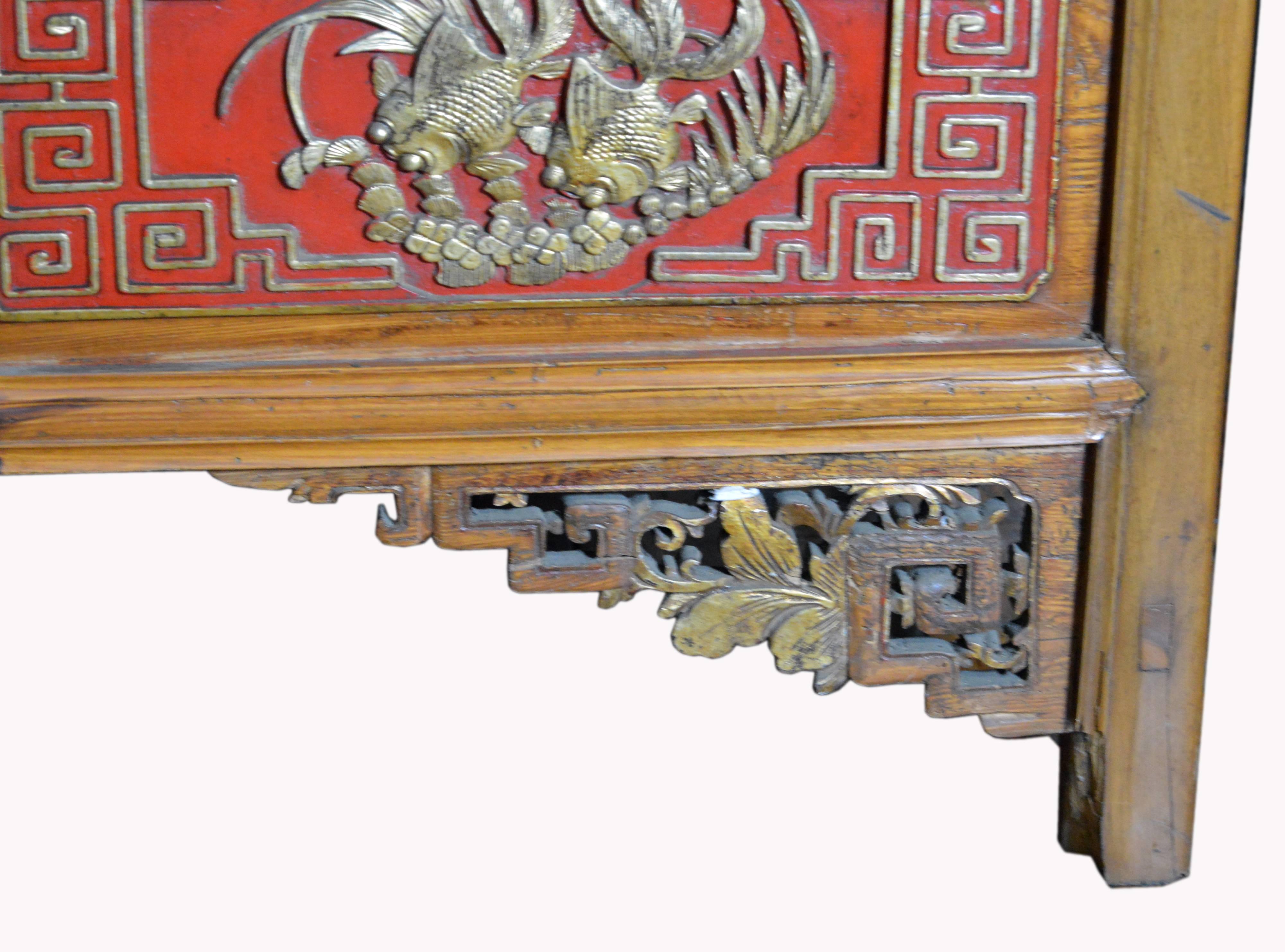 Qing Dynasty 19th Century Chinese Wooden Armoire with Hand-Carved Gilt Panels 10
