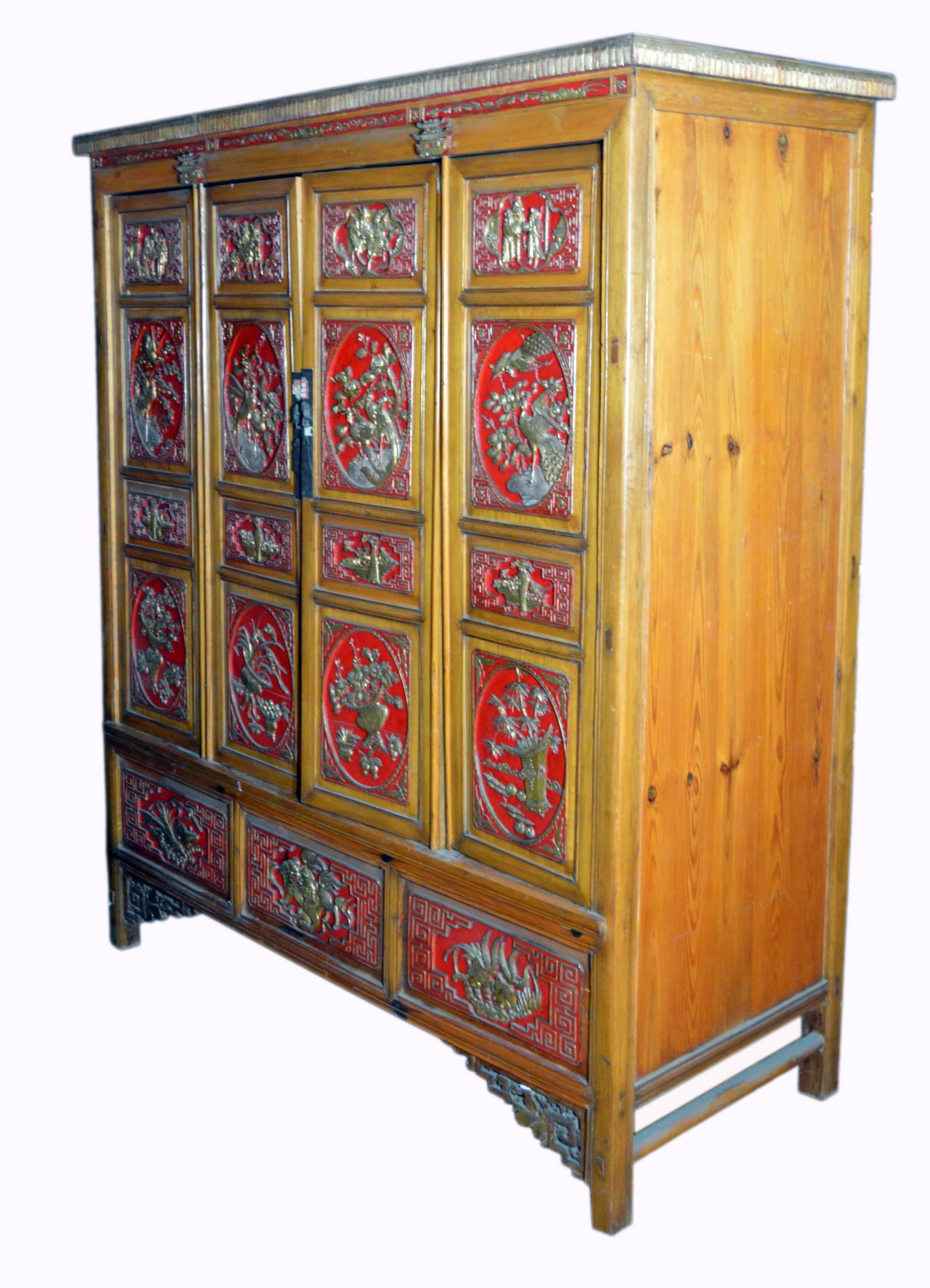 Qing Dynasty 19th Century Chinese Wooden Armoire with Hand-Carved Gilt Panels 12