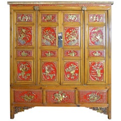 Antique Qing Dynasty 19th Century Chinese Wooden Armoire with Hand-Carved Gilt Panels