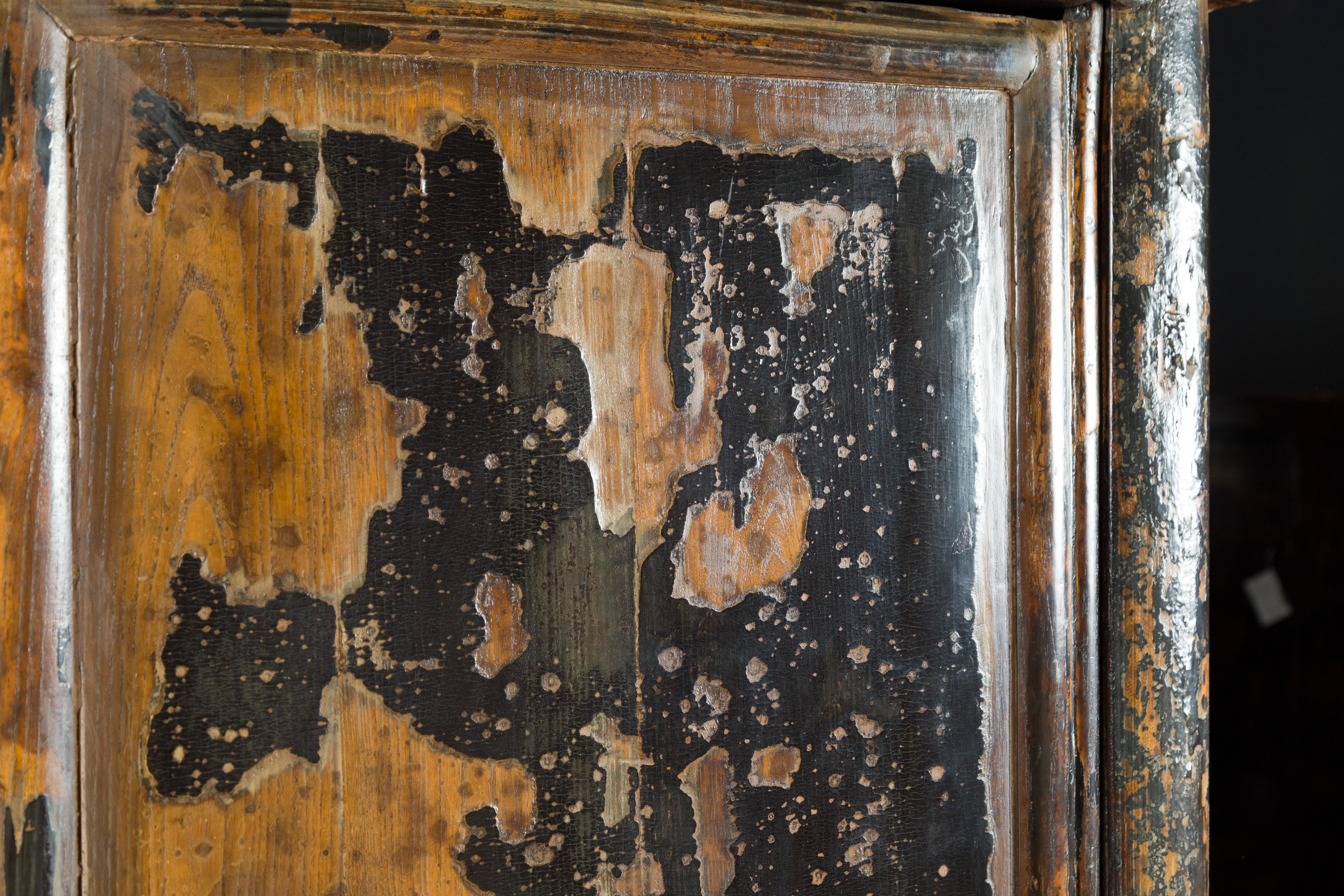distressed black cabinets