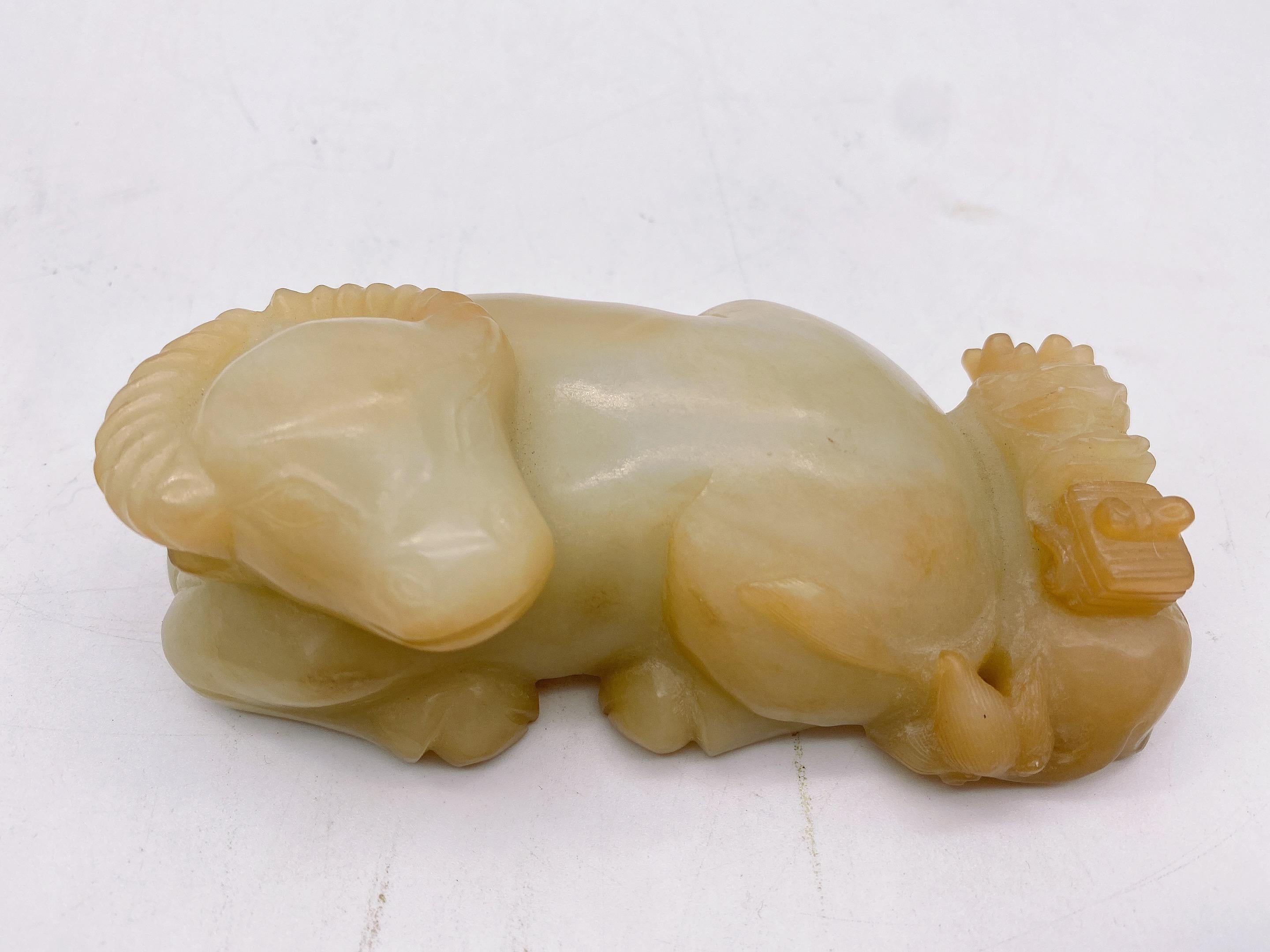 A Qing dynasty Chinese carved jade figure of a bullock. 13 cm x 6cm x 5 cm. weight 600g see more pictures.