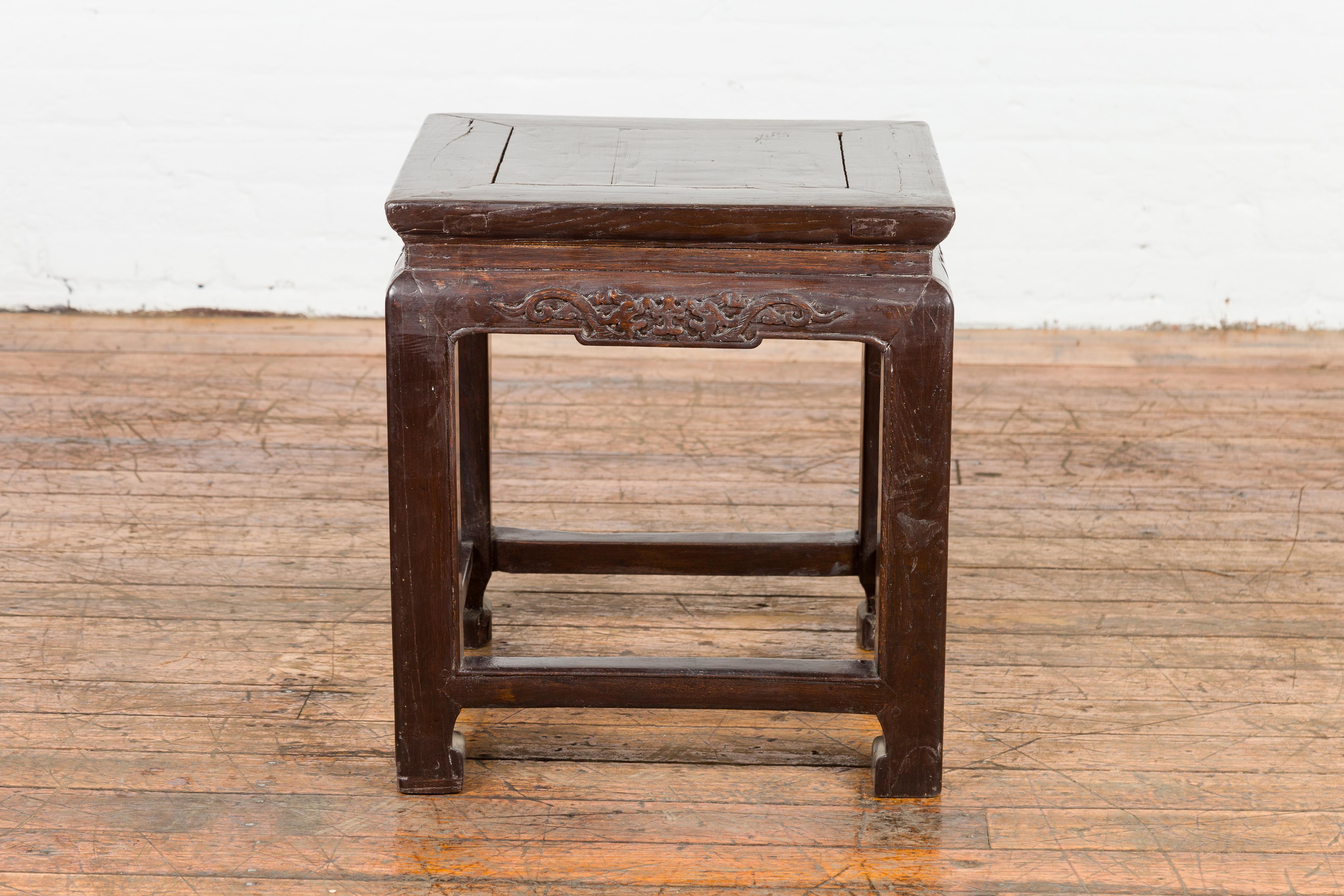 Chinese Qing Dynasty Brown Lacquer Low Table with Carved Apron and Horse Hoof Legs For Sale