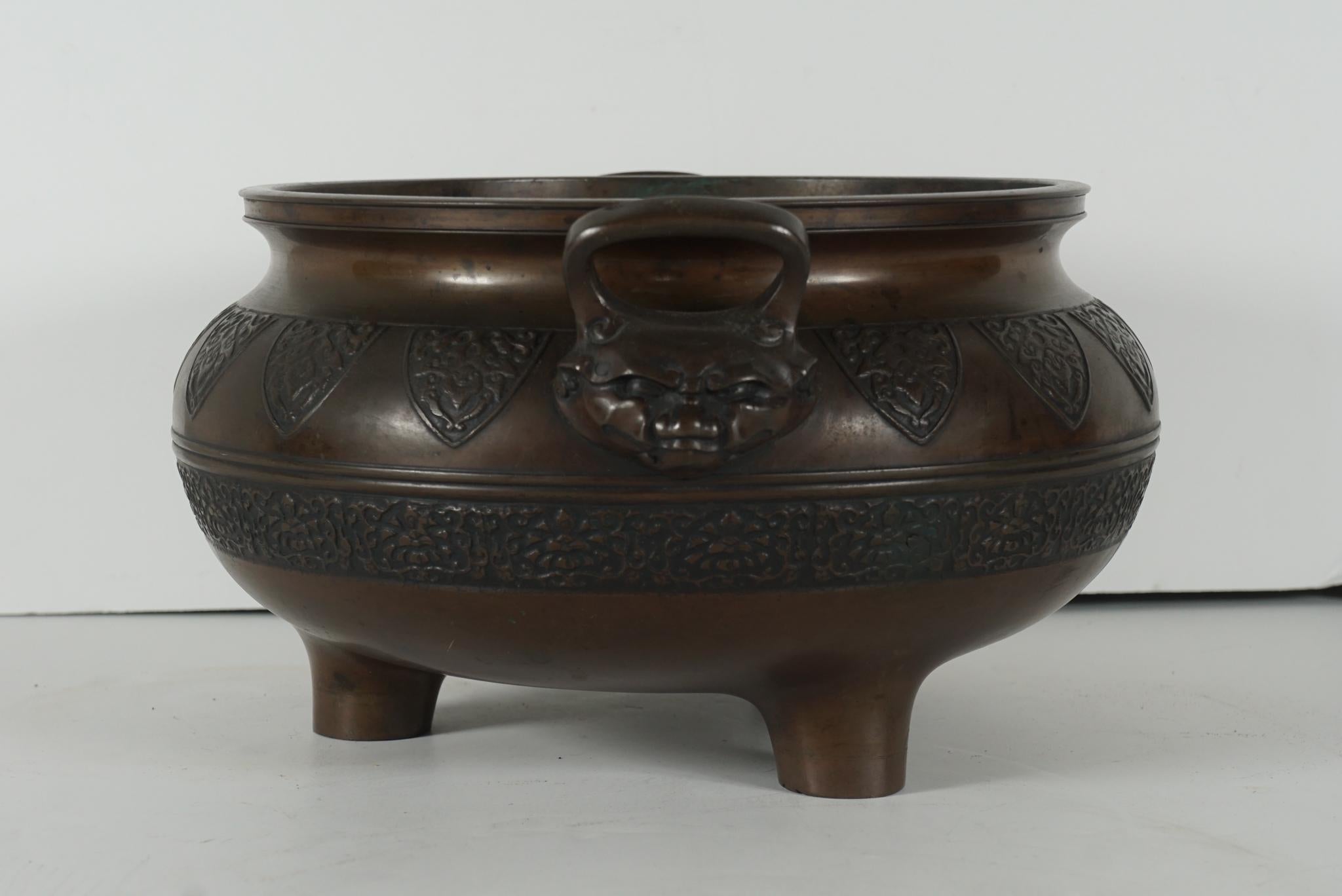 This nicely cast Asian late 19th-century bronze censer would have been used in a fine home or public space as an honored element for the shrine it sat upon. Made circa 1870-1880 the casting is simple and elegant consisting of the pot-bellied form