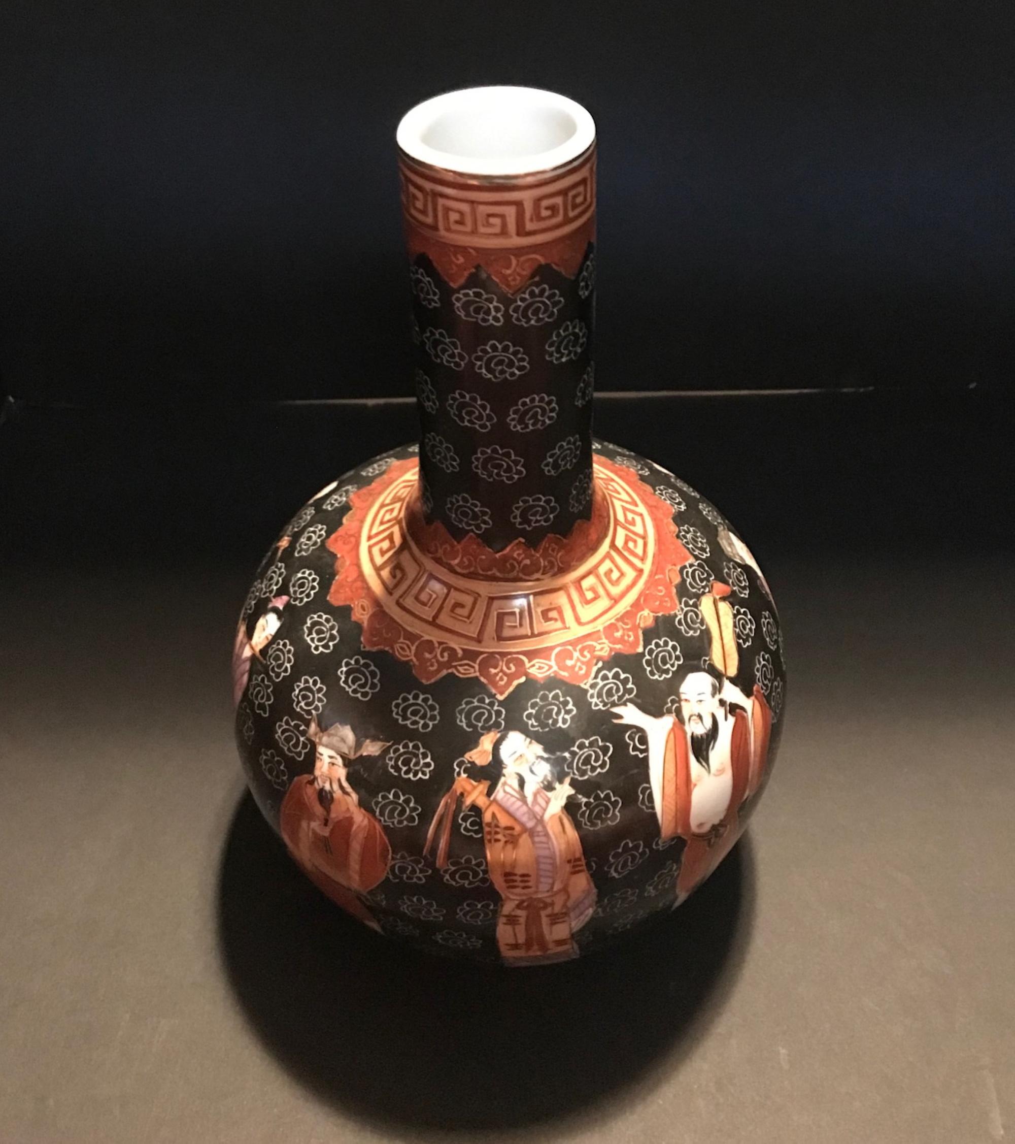 Antique Chinese Wuca bottle vase with immortals Qing dynasty.

This impressive Chinese Wuca bottle vase is decorated with ornaments and eight immortals. The enamel painting of the figures has museum quality. It is a masterful product of the Qing