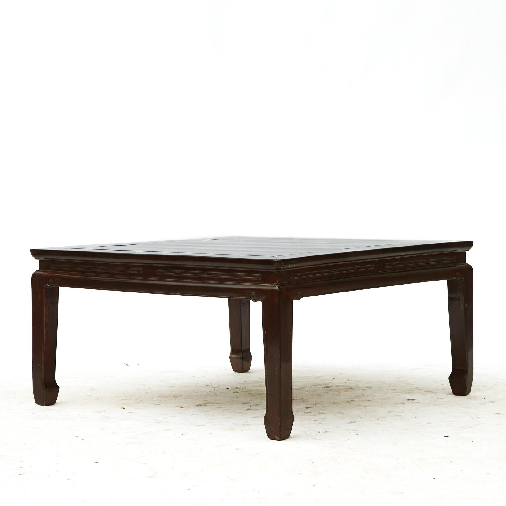 A Chinese Qing Dynasty period elm wood coffee table with square top.
The table has a natural age-related patina.

From Jiangsu province, Qing period, 1860-1880.