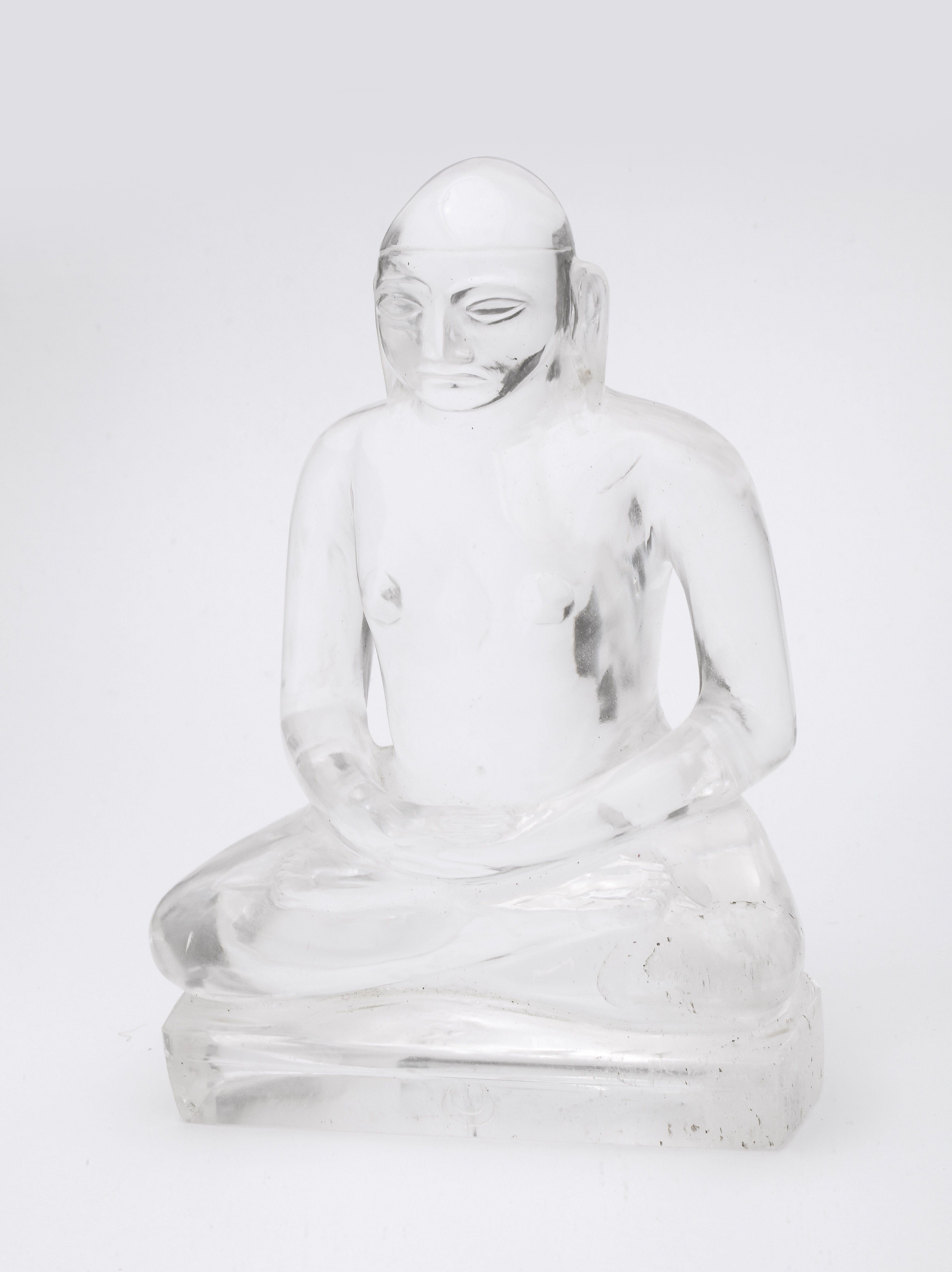 Chinese carved rock crystal figure of Buddha, Qing Dynasty, seated in meditation, incised crescent moon mark to lower edge at front, Measures: 5