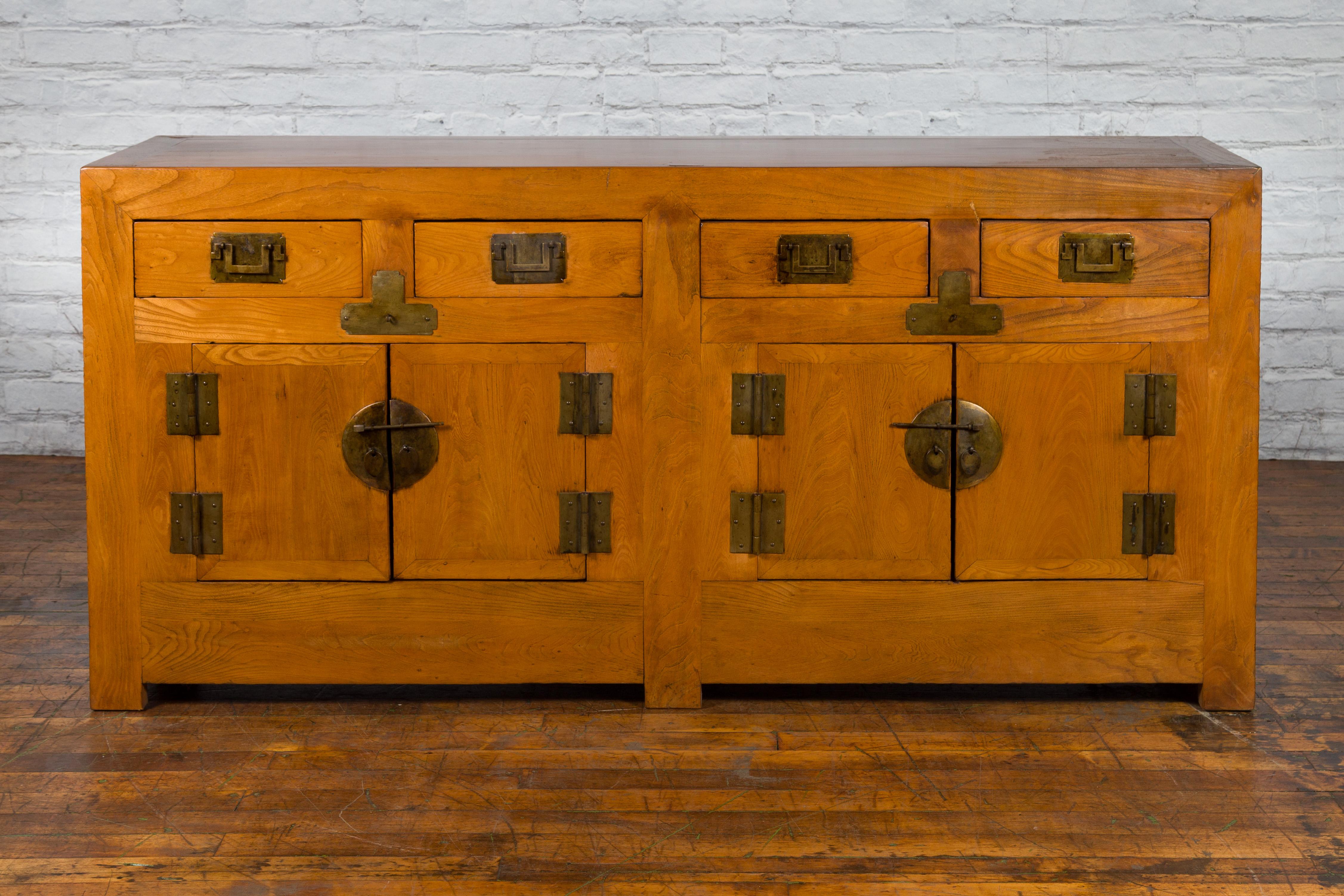 Chinese Qing Dynasty Elm Sideboard with Four Drawers over Four Doors and Natural Patina For Sale