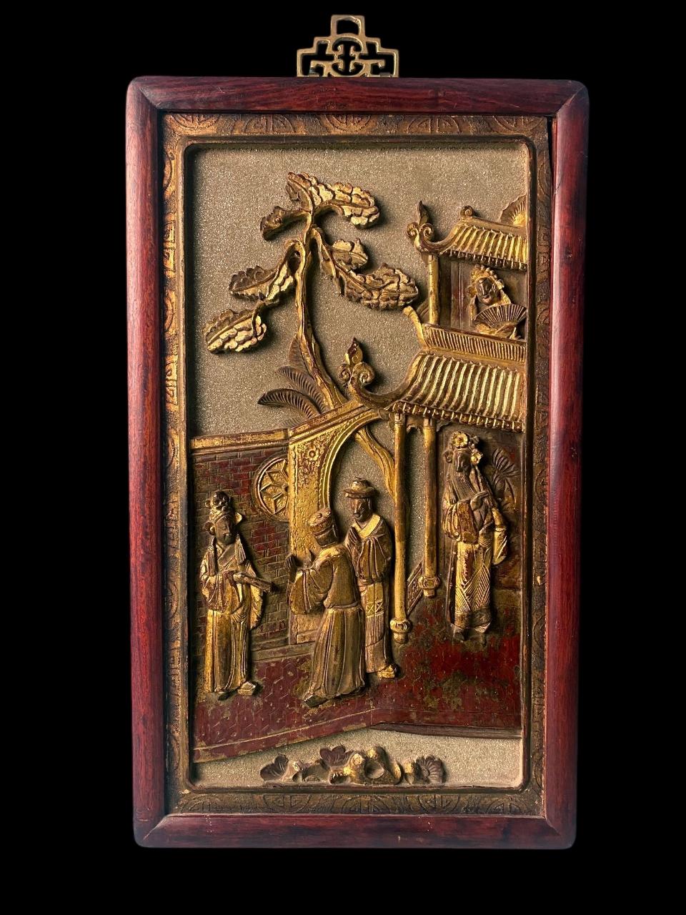 Chinoiserie Qing Dynasty Exquisite Chinese Wooden Panel With Raised Figures And Gold Leaf For Sale