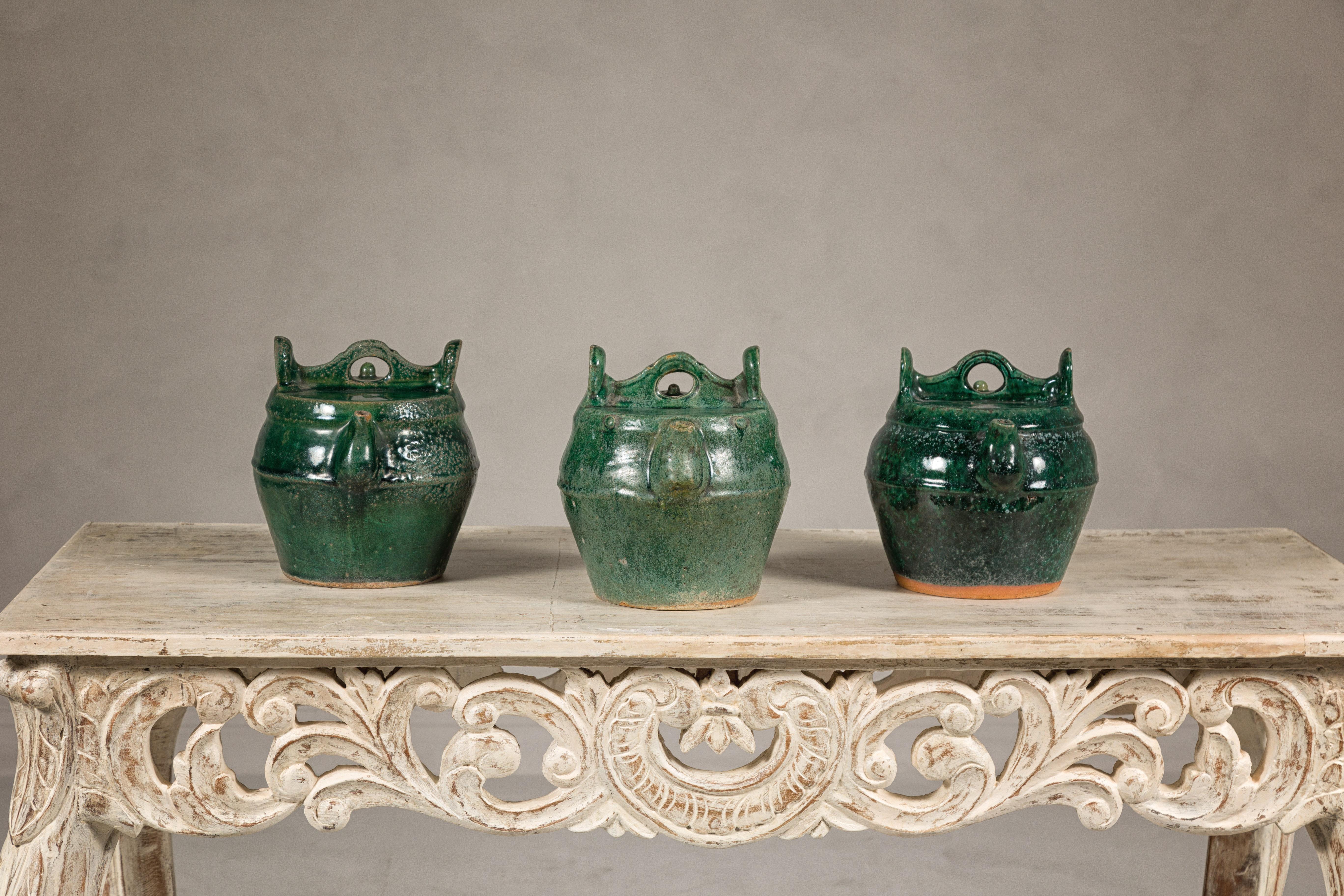 Chinese Qing Dynasty Green Glaze Late 19th Century Shiwan Ware Pottery Teapots Sold Each For Sale