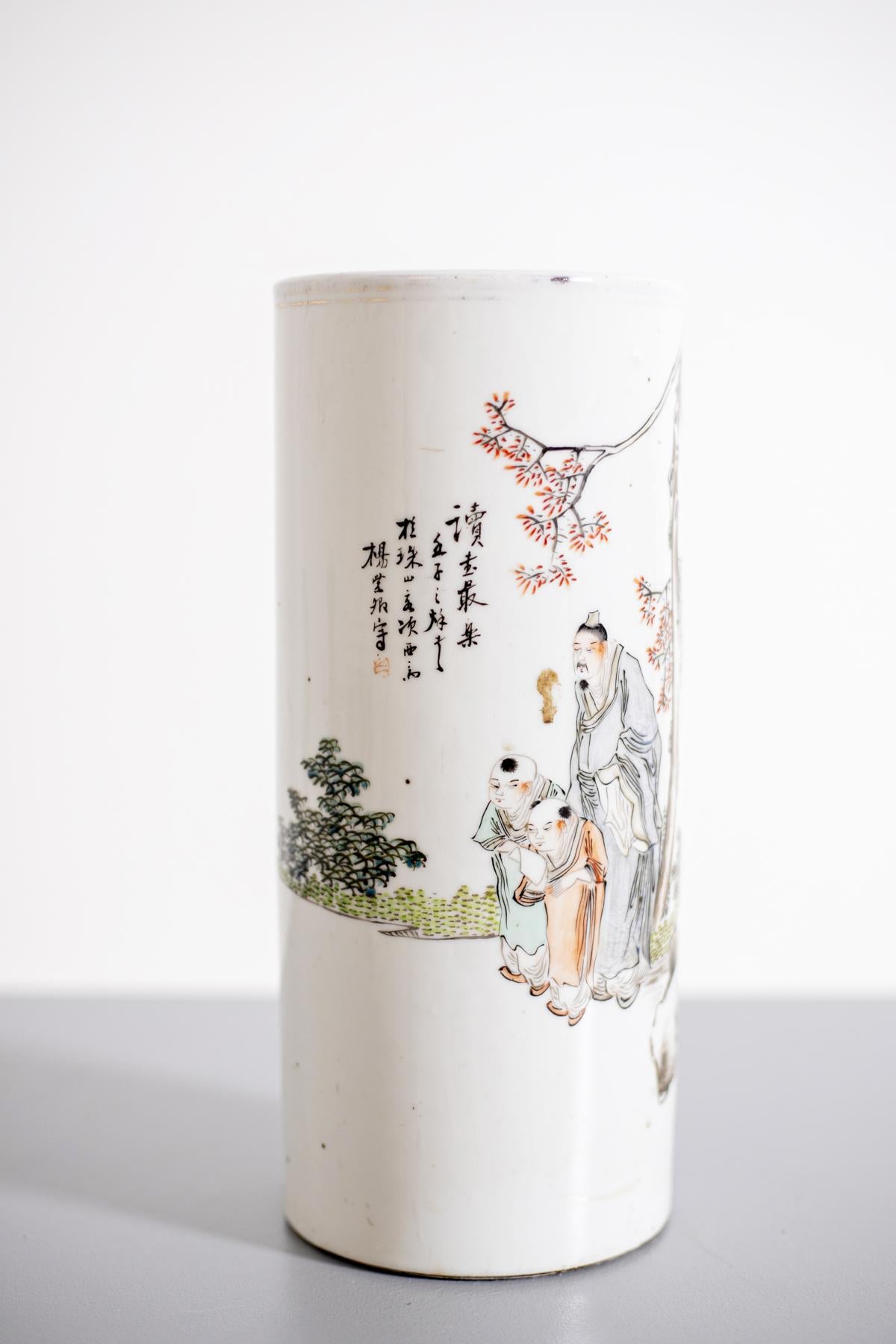 Porcelain vase, polychrome Chinese decoration with characters and ideograms. This vase was created at the end of the 19th century, made entirely of durable white porcelain, with decoration.
This vase depicts a teaching scene: a taller figure stands
