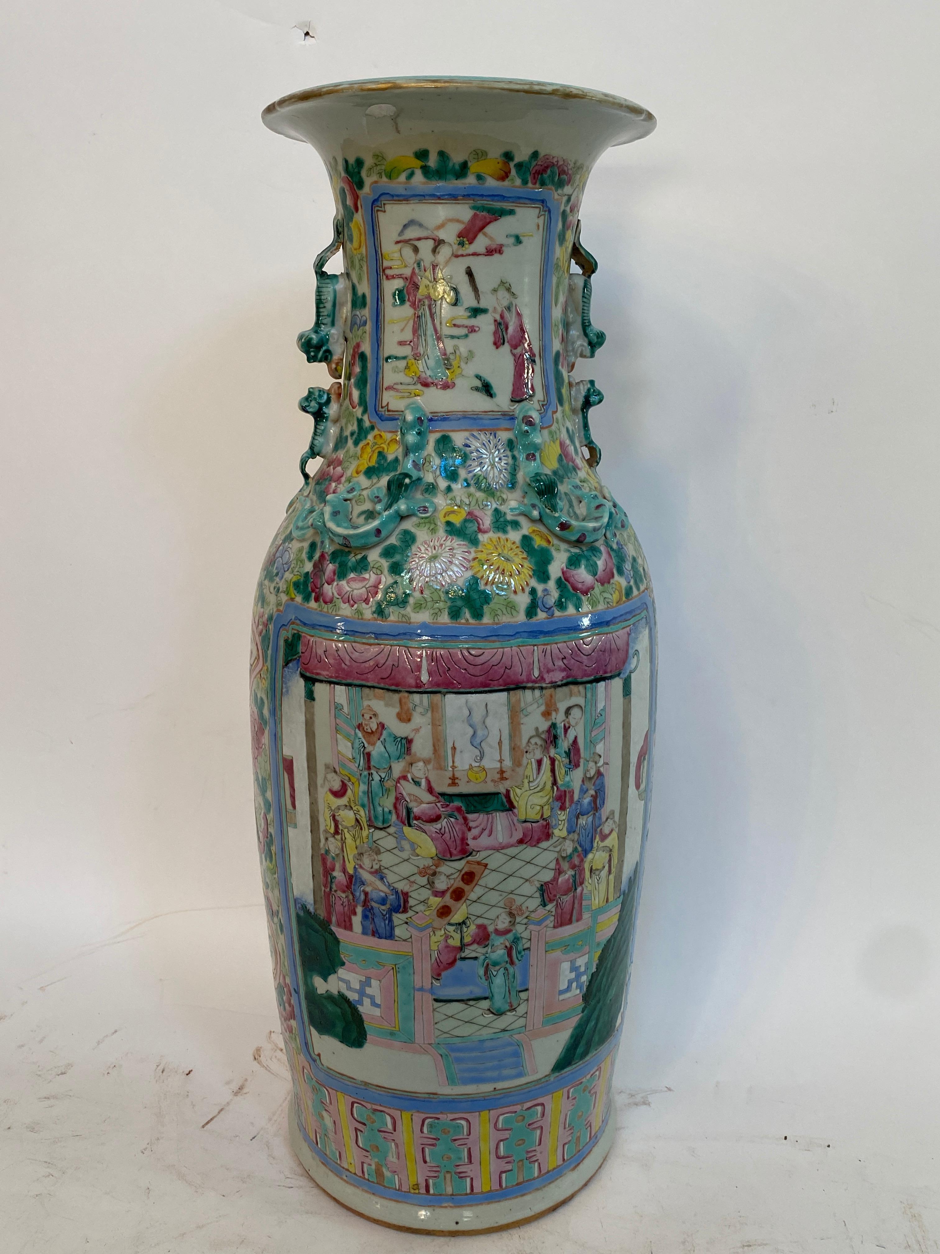 Qing Dynasty large 23.75” canton famille rose Chinese porcelain vase with two panels of figures and horses, the sides with birds and flowers double pairs of dogs handles and 2 pairs of facing dragons applied, overall 24” height x 9.5” diameter, see