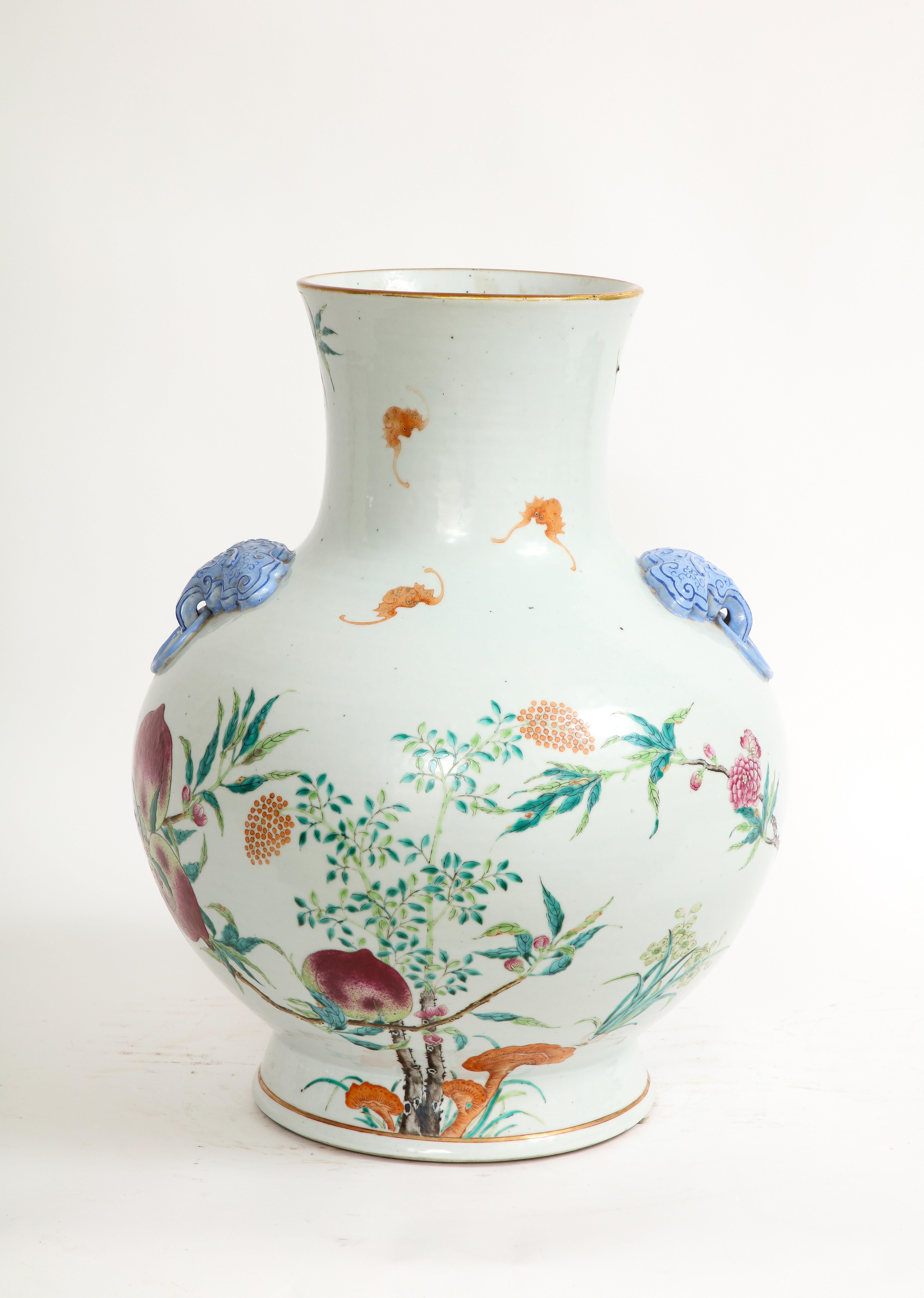 Porcelain Qing Dynasty Large Chinese Blue Foo Dog Handled Famille-Rose Nine Peach Vase