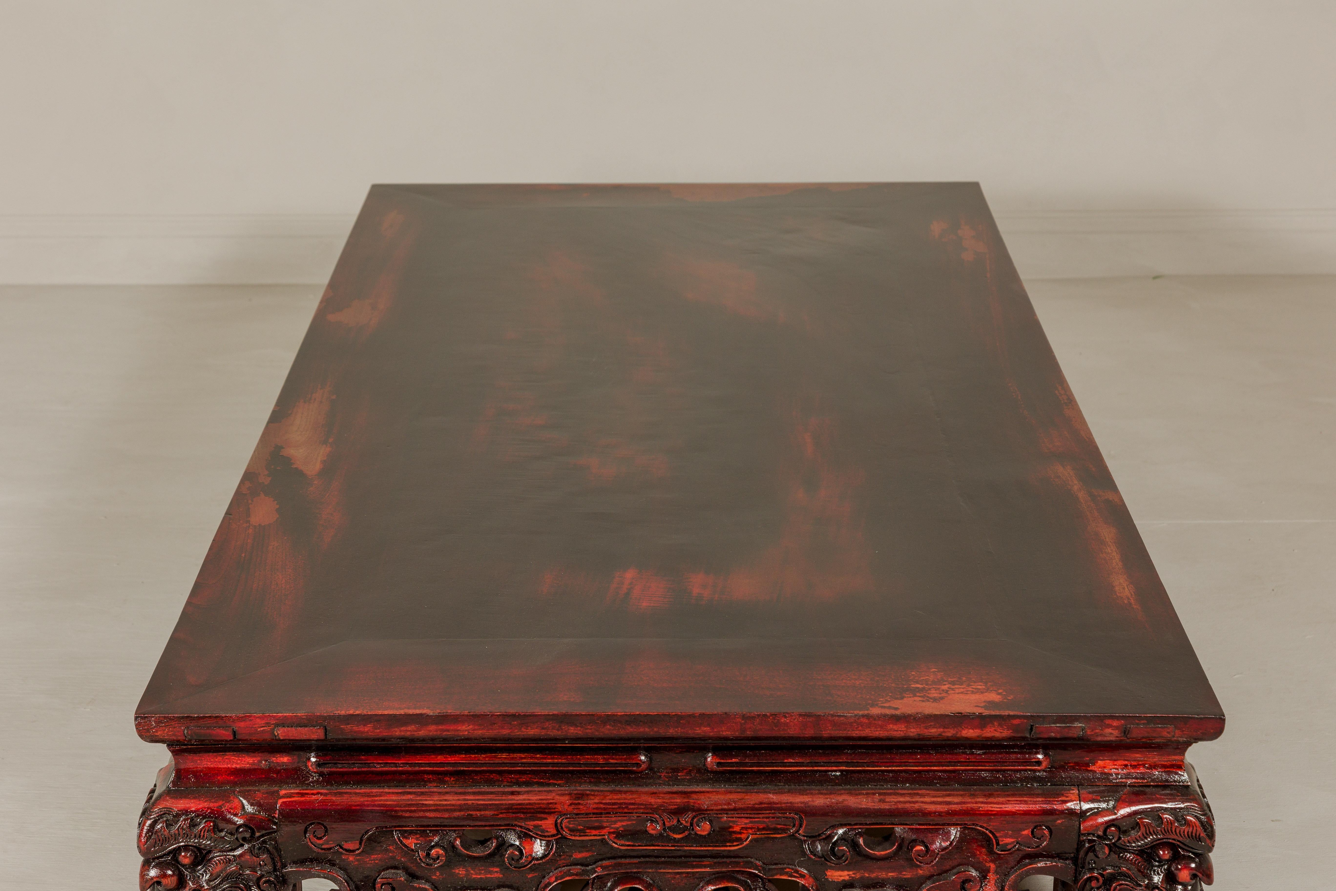 Qing Dynasty Low Kang Coffee Table with Reddish Brown Finish and Carved Décor For Sale 6