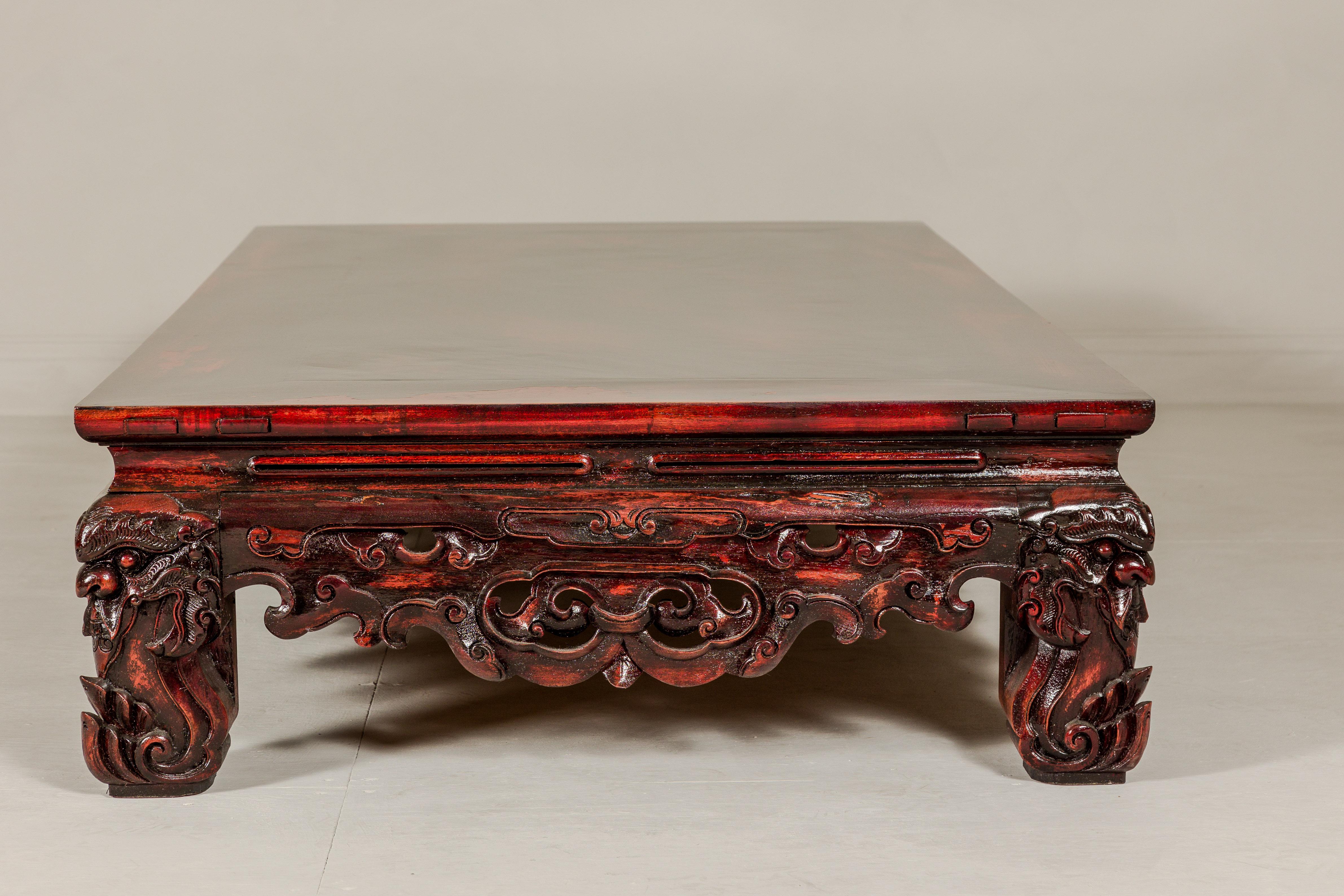 Qing Dynasty Low Kang Coffee Table with Reddish Brown Finish and Carved Décor For Sale 10
