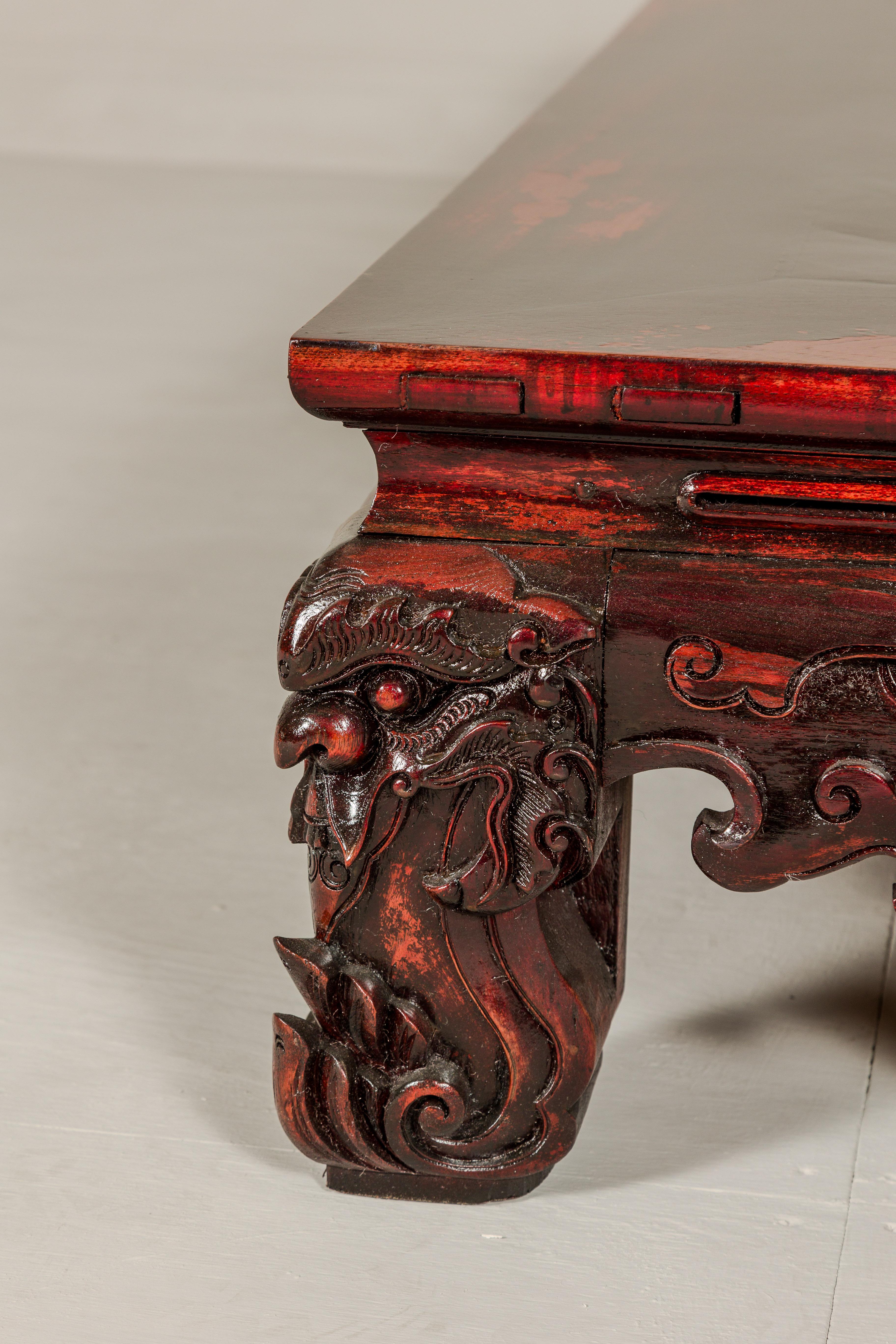 Qing Dynasty Low Kang Coffee Table with Reddish Brown Finish and Carved Décor For Sale 11