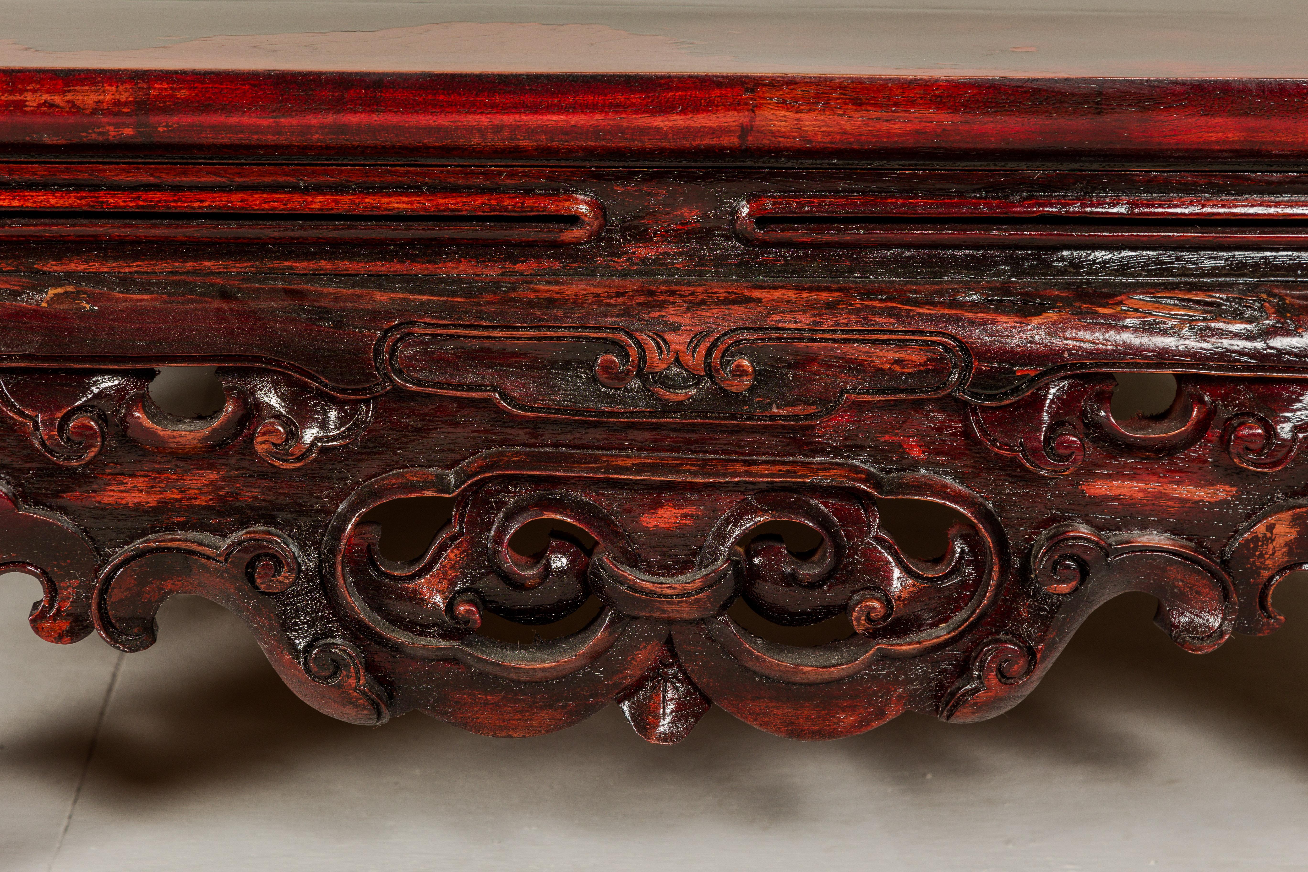 Qing Dynasty Low Kang Coffee Table with Reddish Brown Finish and Carved Décor For Sale 12