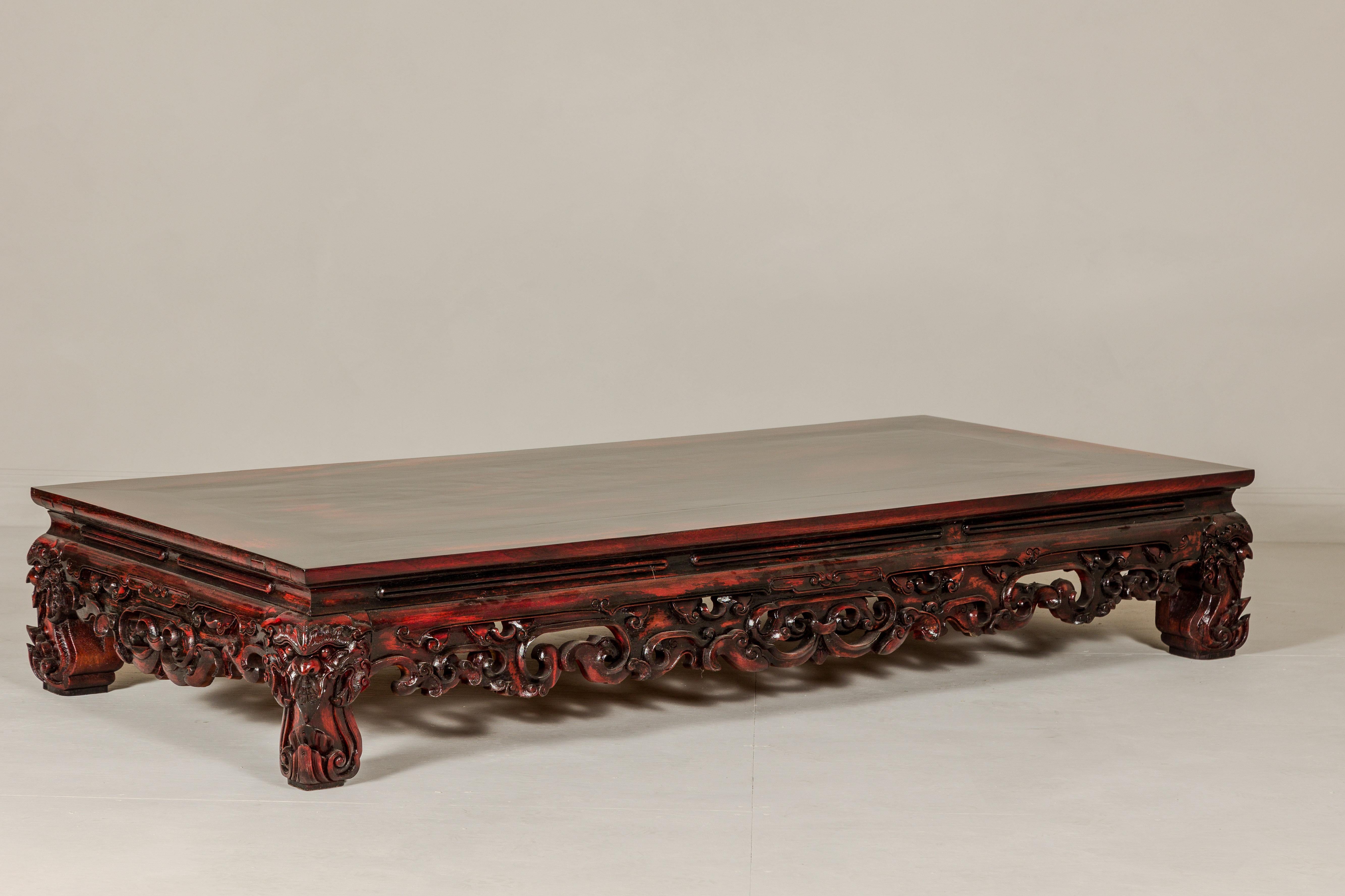 Qing Dynasty Low Kang Coffee Table with Reddish Brown Finish and Carved Décor For Sale 2