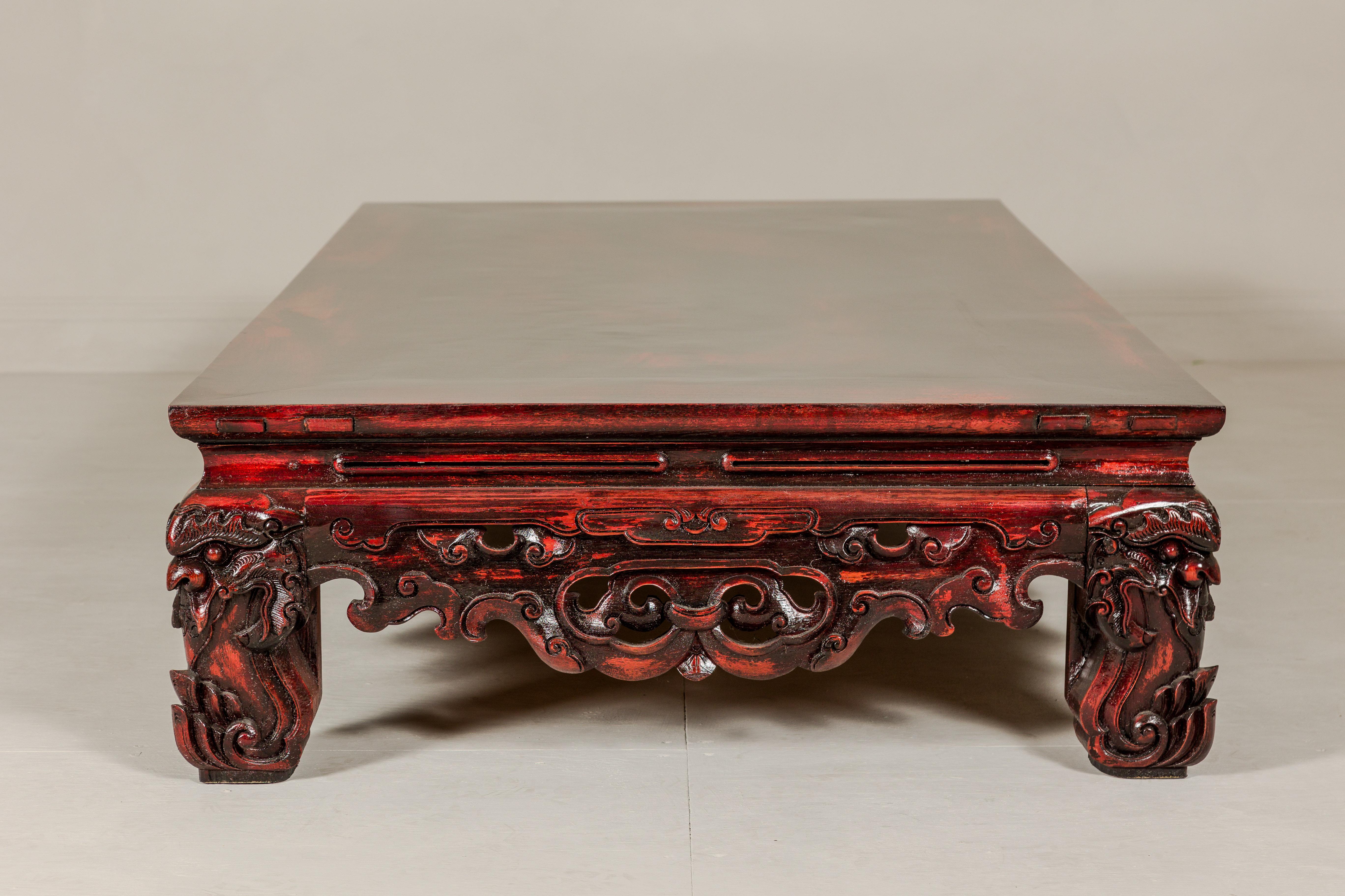 Qing Dynasty Low Kang Coffee Table with Reddish Brown Finish and Carved Décor For Sale 3