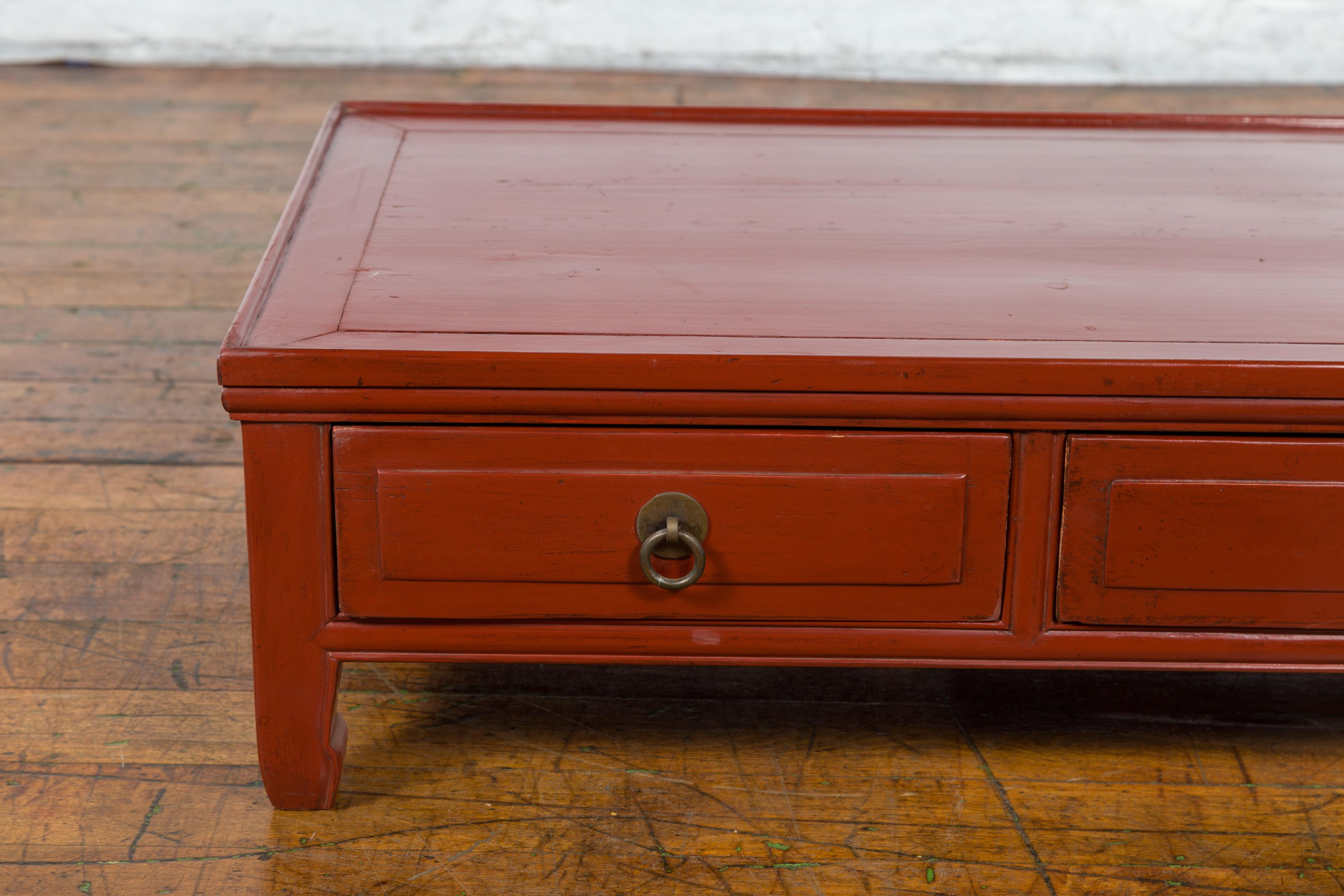 Lacquered Qing Dynasty Red Lacquer Low Kang Coffee Table with Drawers and Horse Hoof Feet For Sale