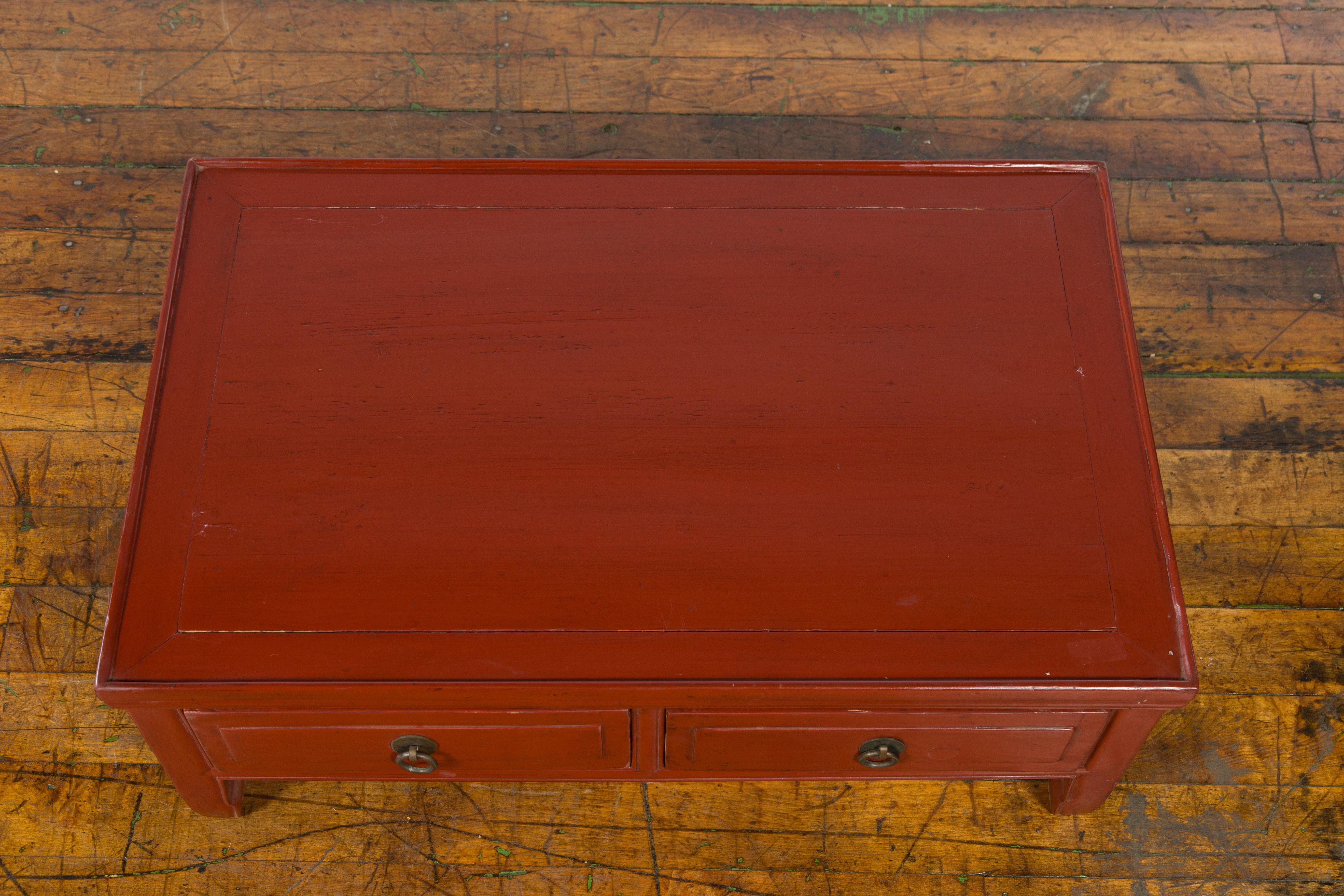 19th Century Qing Dynasty Red Lacquer Low Kang Coffee Table with Drawers and Horse Hoof Feet For Sale