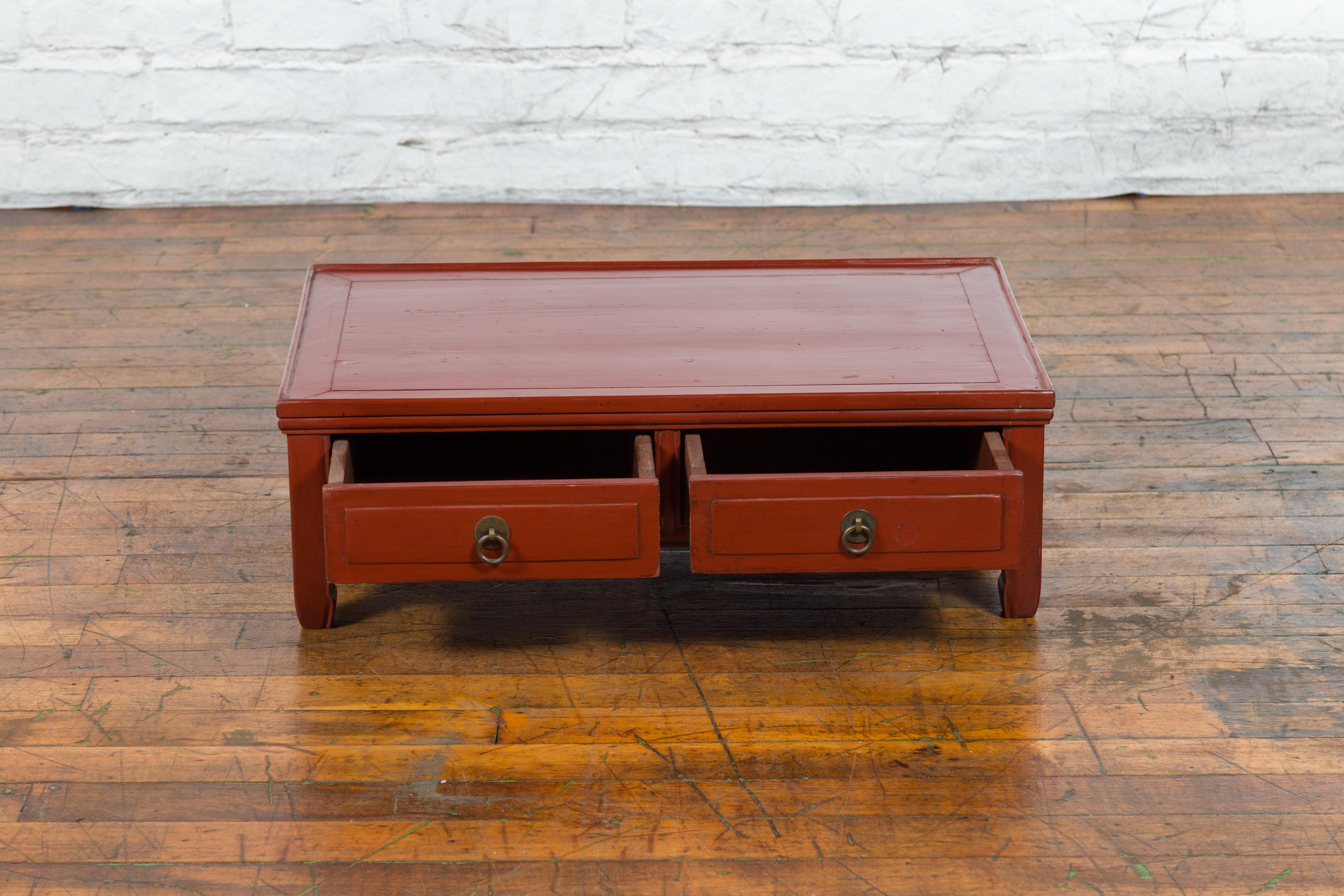 Brass Qing Dynasty Red Lacquer Low Kang Coffee Table with Drawers and Horse Hoof Feet For Sale