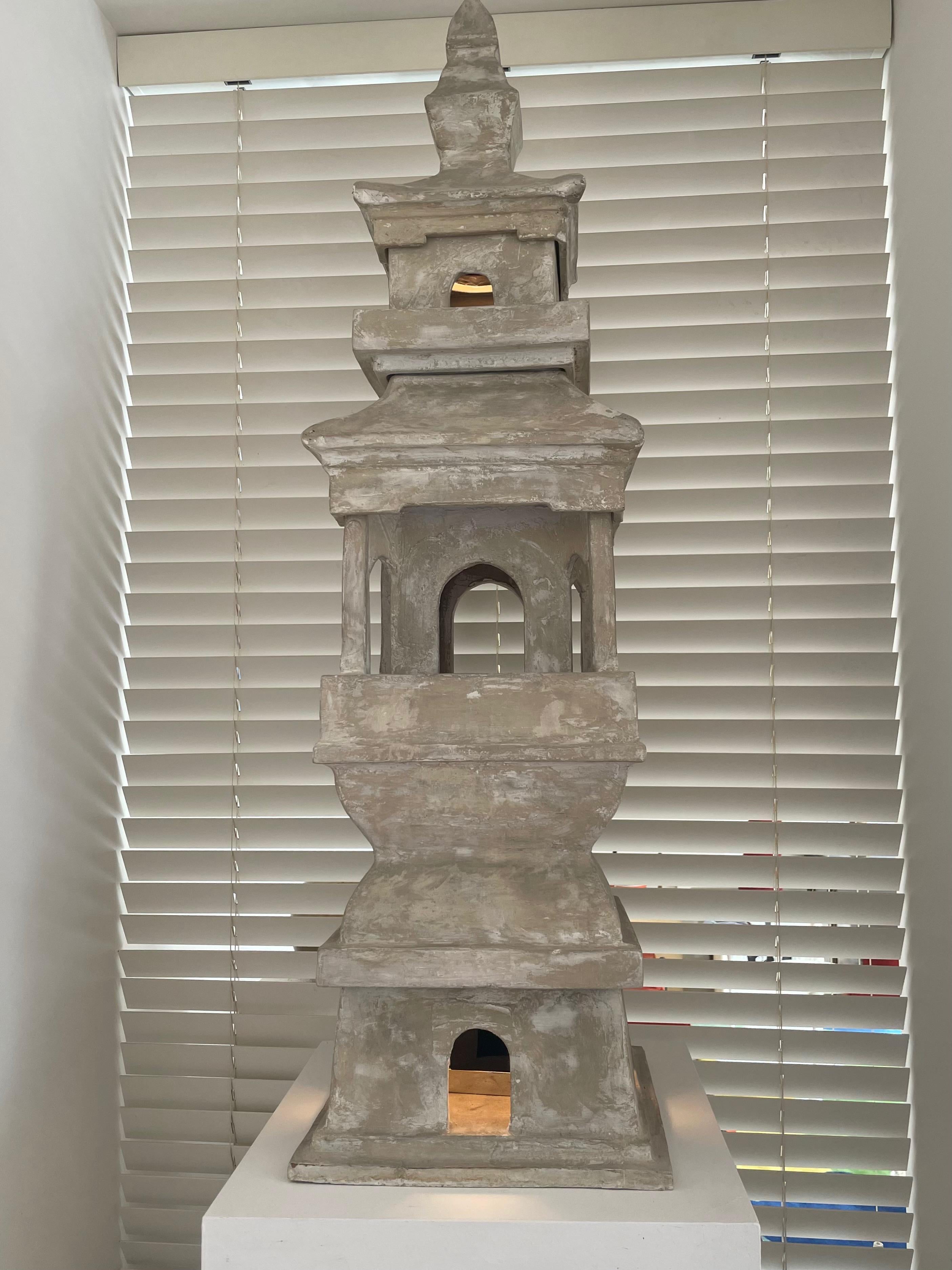Qing dynasty terracotta pagoda.
The pagoda comes in six separate pieces.
In the style of Tony Duquette.