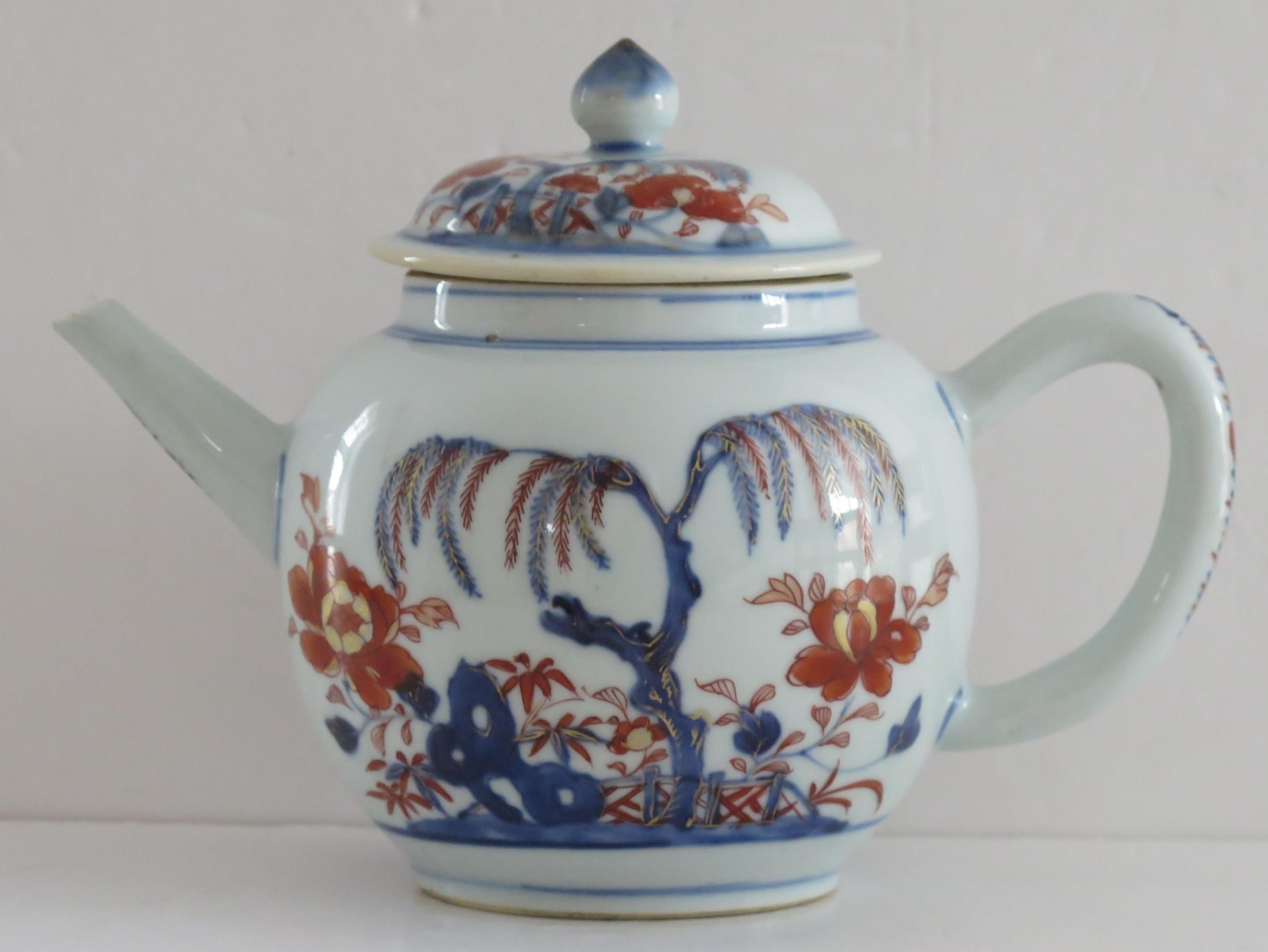 This is a very good early Chinese Teapot and matching cover from the Qing Dynasty, Kangxi period ( 1662 to 1722) which we date to Circa 1710.

The teapot has a globular form on a short foot-rim, with a curved 