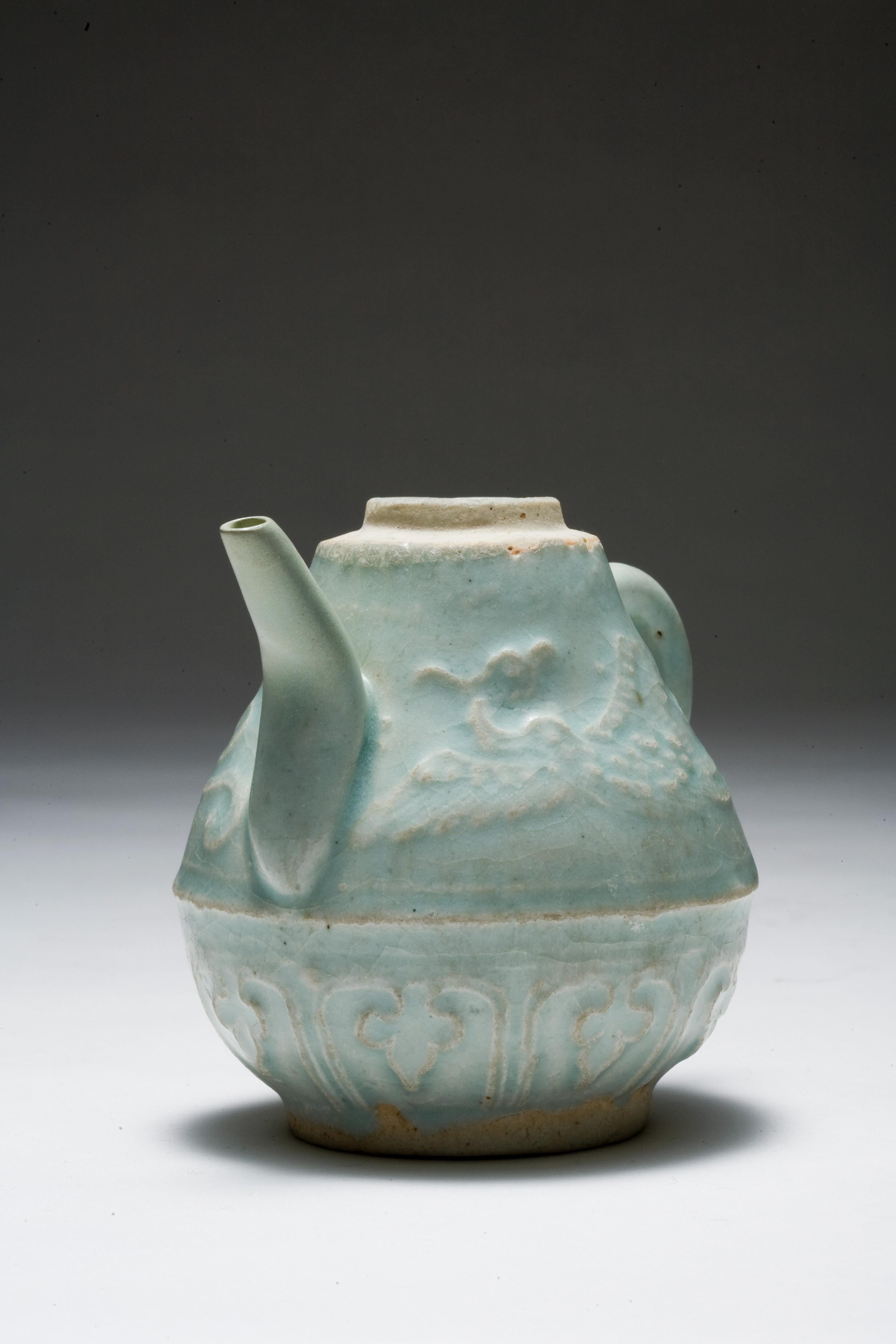 Chinese Qingbai ewer with slip decoration of two phoenix and lotus leaves, Yuan Dynasty For Sale