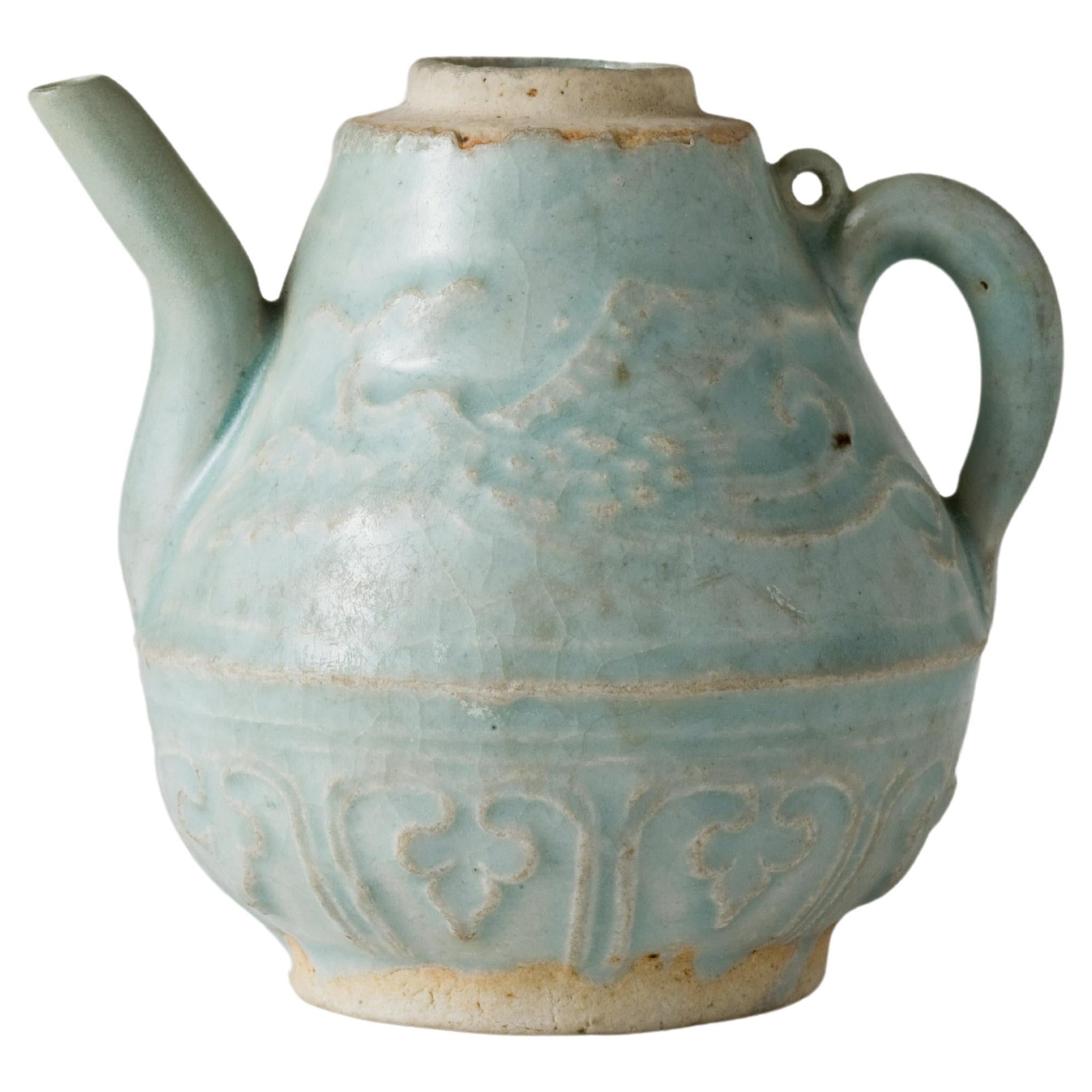 Qingbai ewer with slip decoration of two phoenix and lotus leaves, Yuan Dynasty For Sale
