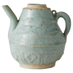 Qingbai ewer with slip decoration of two phoenix and lotus leaves, Yuan Dynasty