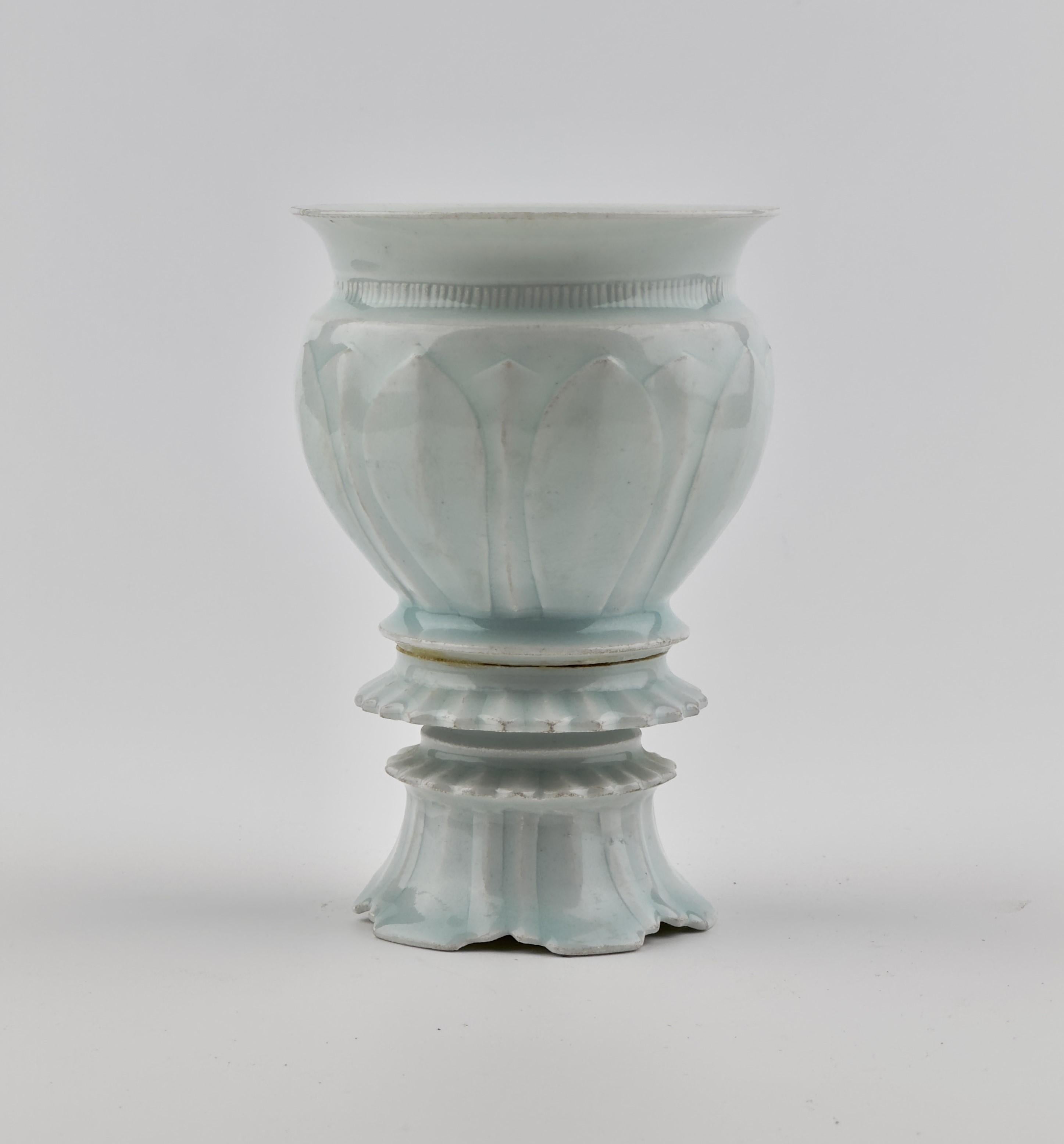 This exquisite Qingbai piece, acquired in Hong Kong in the late 1990s, is a high-quality artifact from the Southern Song Dynasty, likely produced at the Hutian Kiln. The base exhibits characteristic firing marks, typical of Qingbai porcelain. These