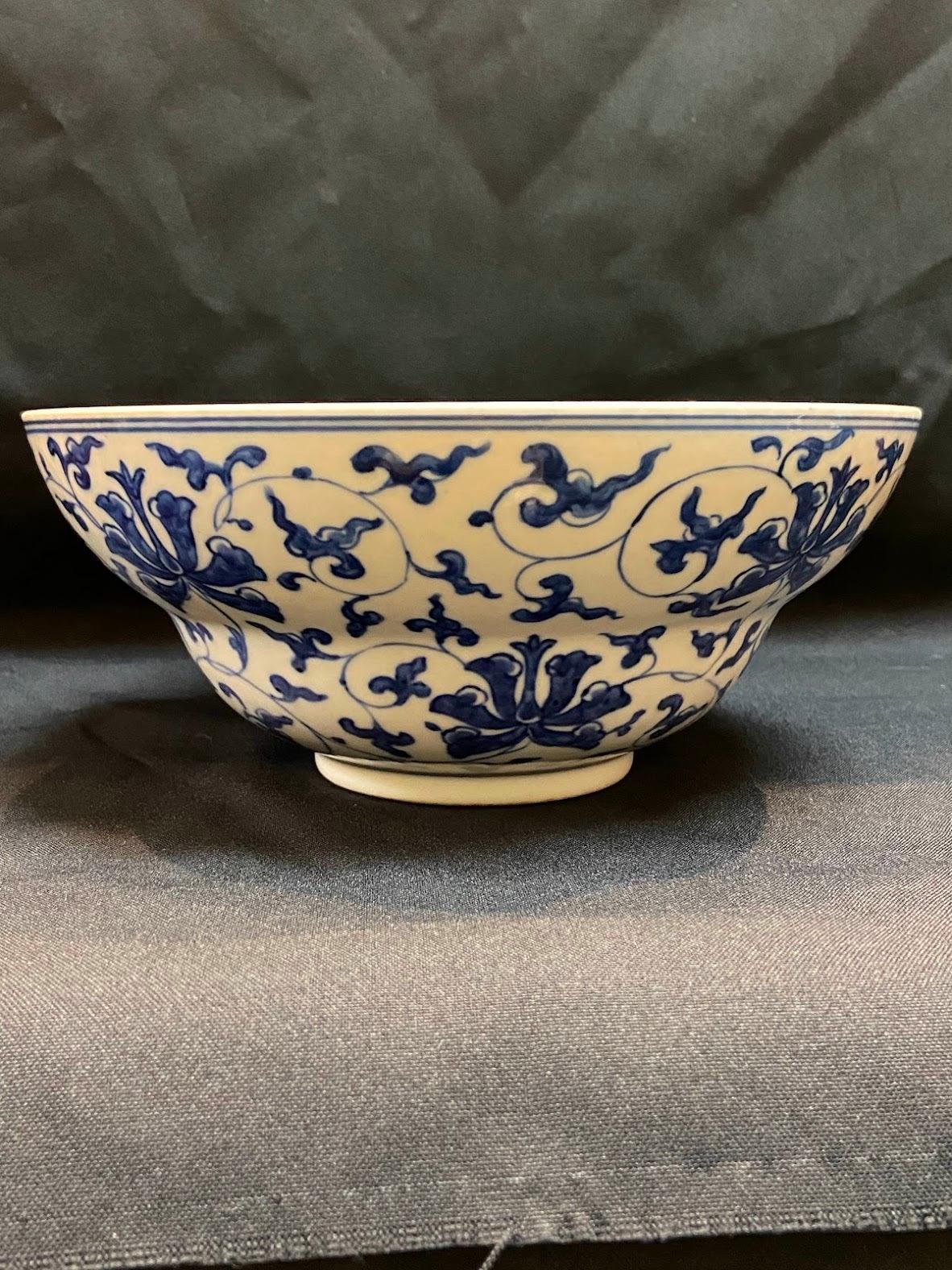 Glazed Qing, Mid Period Blue and White Folding-Lotus Pattern Porcelain Bowl For Sale