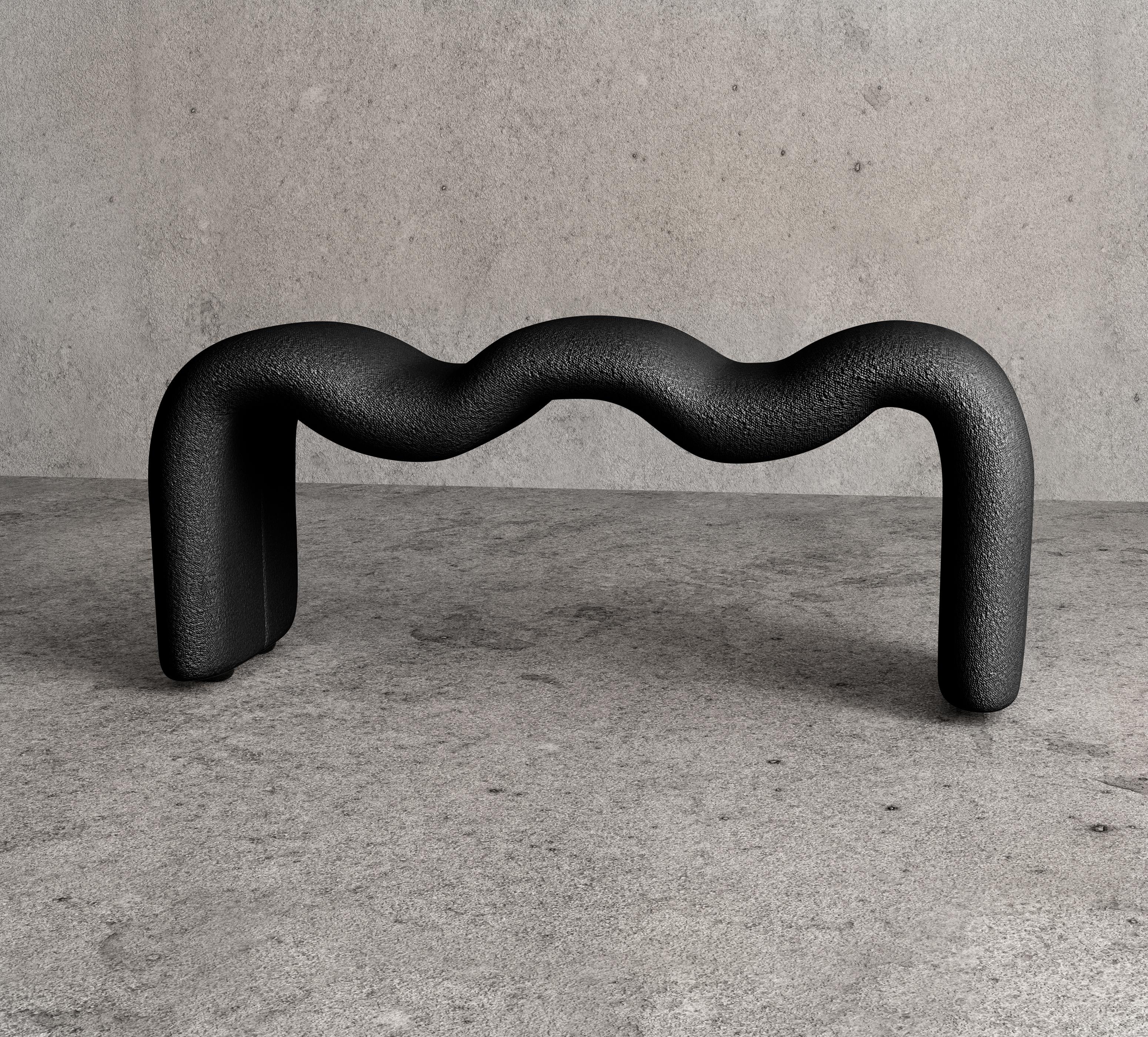 Flowy squiggle bench from the Bubbly collection by Koki Design House. Constructed from ultra soft polythene foam with a steel frame and upholstered in bouclé fabric. 