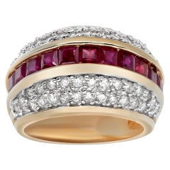 Quad-row diamond ring with channel set rubies in yellow gold