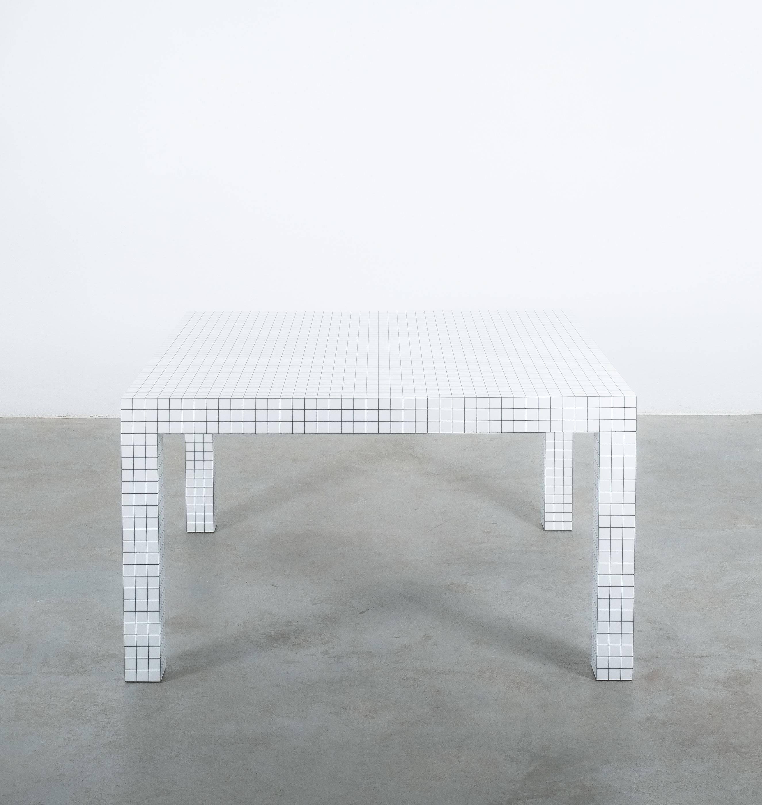 Original Superstudio table Quaderna from Zanotta, produced circa 1970-1980

Rare iconic dining table designed by the Italian radical design group Superstudio, for Zanotta, 1970. Table laminate finish with 3 cm square printed grid motif. It's in
