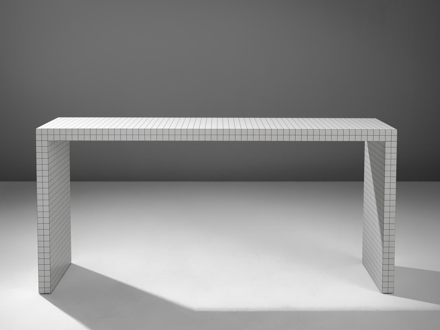 Quaderna table, design by Superstudio for Zanotta, Italy, 1970s.

This iconic Superstudio that was founded in Florence by Cristiano Toraldo di Francia and Adolfo Natalini in 1960. The table has a honeycomb structure coated with Print white plastic