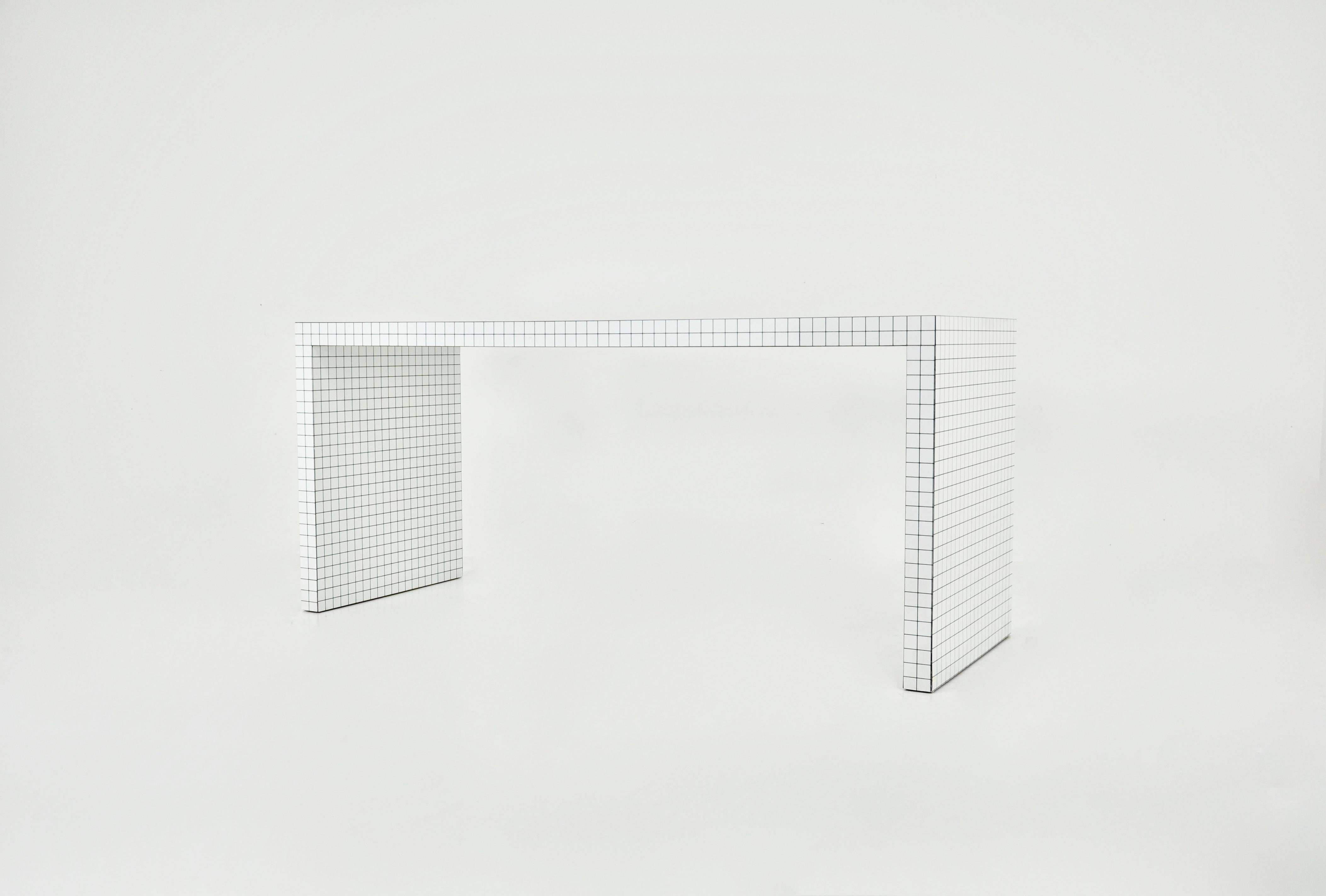 White and black formica table by Superstudio.  Wear due to time and age of the table.
