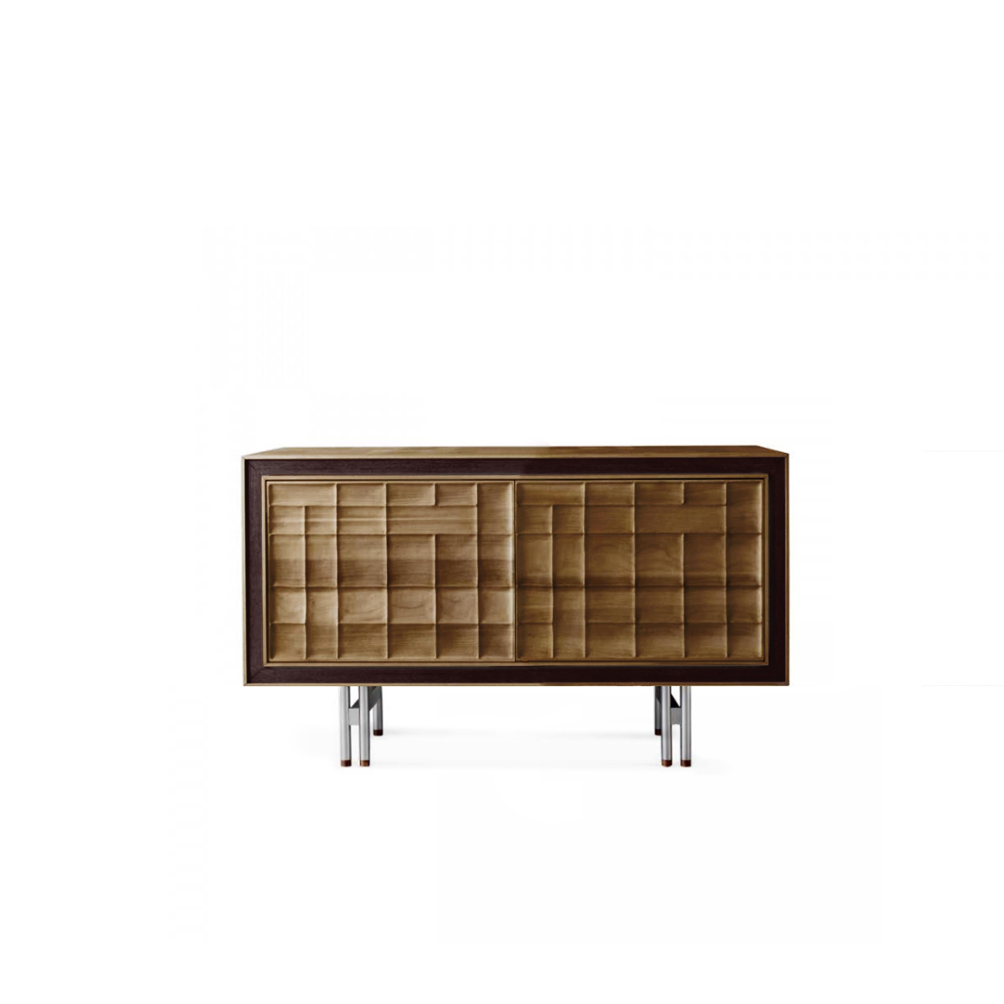 Enfilade Quadra Scacco de Dale Italia
Dimensions : D 50 x L 132 x H 83 cm.
MATERIAL : Noyer.

Cadre en bois de noyer. Disponible en version 2 ou 3 portes. Disponible dans de nombreuses variantes et dans des finitions en noyer naturel ou gris. Les