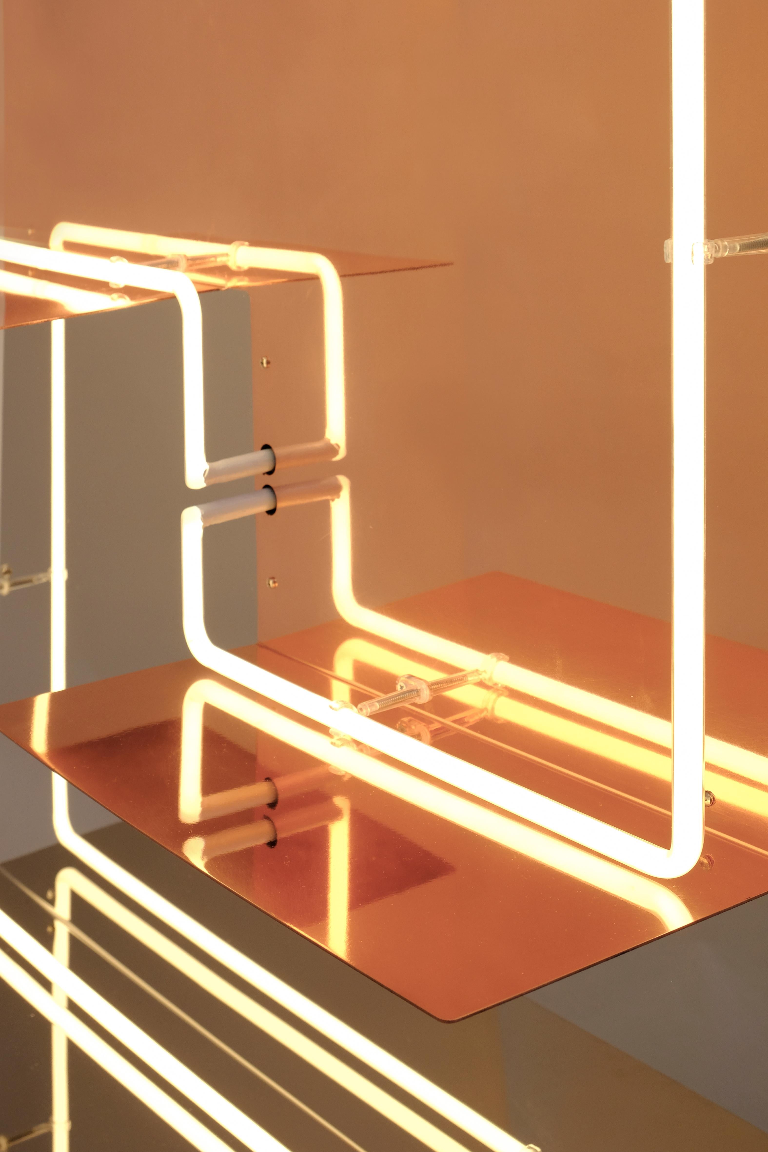 Quadri Luminosi' or 'Bright artworks' is a limited edition of supermirror shelves with a luminous graphic design which runs around it. The metal materials, stainless steel supermirror and polished copper reflect the ambience in which they are hung,
