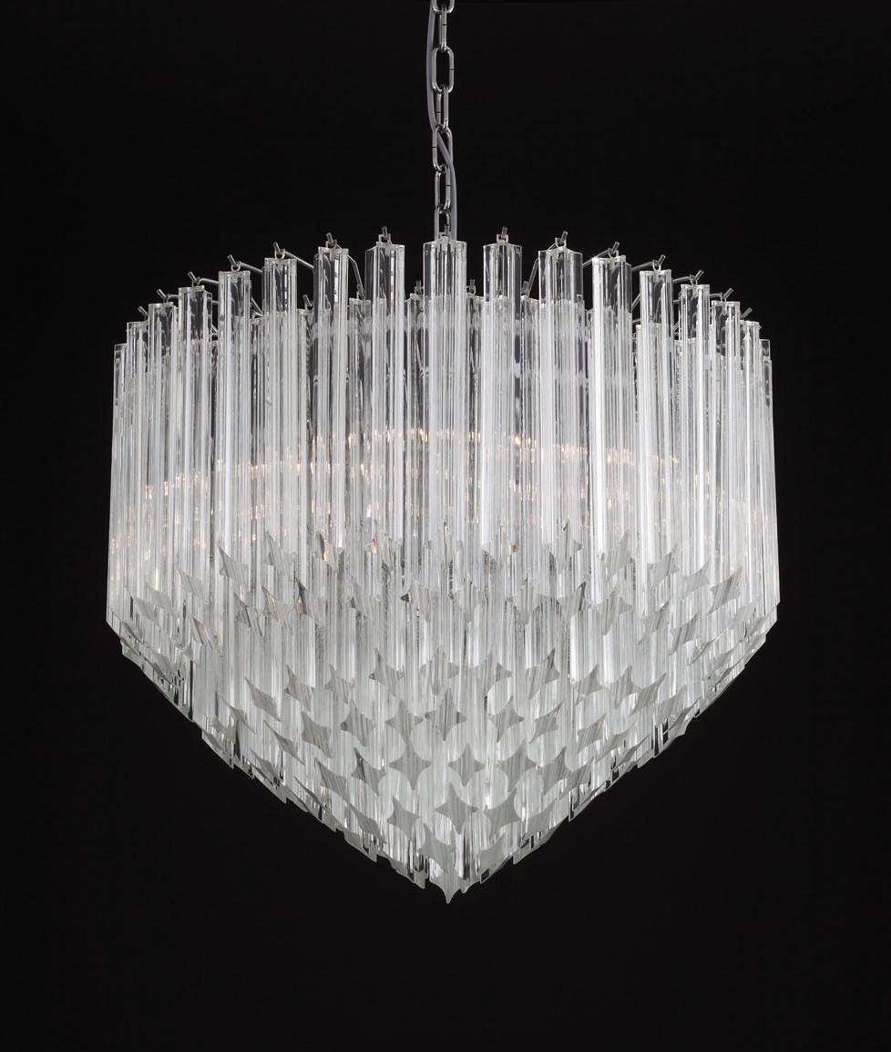 Italian chandelier with clear Murano glasses cut in Quadriedri technique arranged in descending layers on chrome finish metal frame by Fabio Ltd / Inspired by Venini / Made in Italy
8 lights / E12 or E14 type / max 40W each
Diameter: 23.5 inches /
