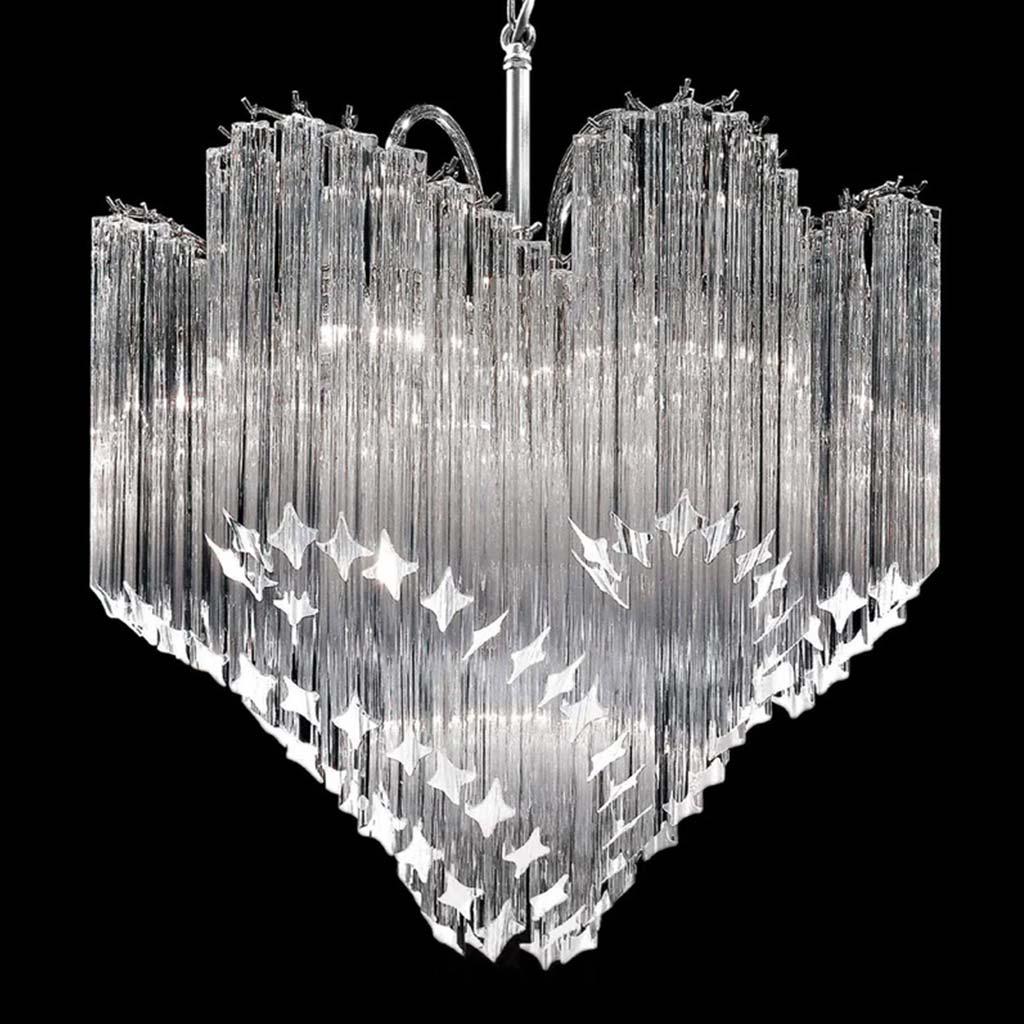 Italian chandelier with clear Murano glasses cut in Quadriedri technique arranged in multiple spiral shape mounted on chrome finish metal frame / Made in Italy
7 lights / E12 or E14 type / max 40W each
Diameter: 23.5 inches / Height: 25.5 inches