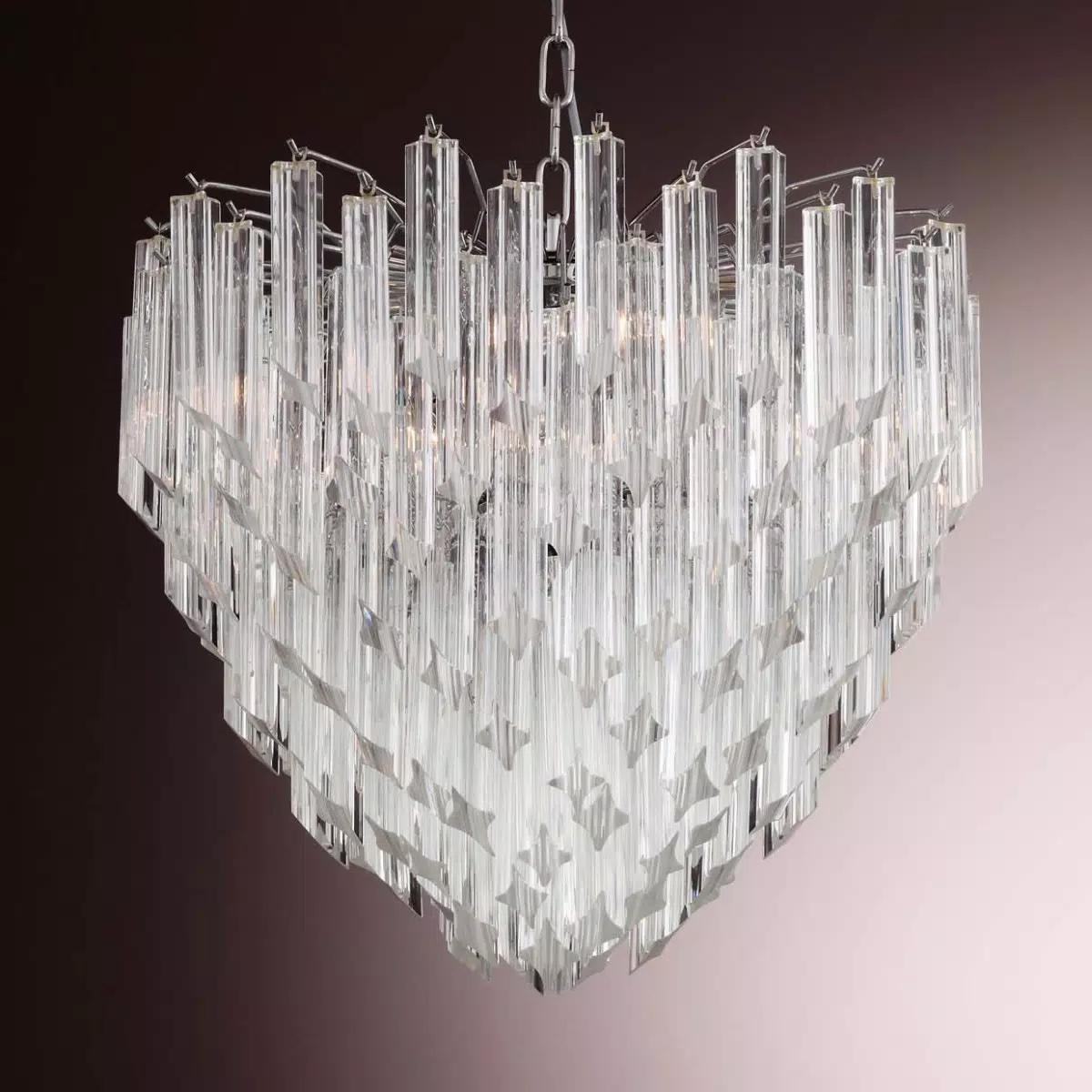Italian chandelier with clear Murano glasses cut in Quadriedri technique arranged in descending layers on chrome finish metal frame / Made in Italy
6 lights / E12 or E14 type / max 40W each
Diameter: 22 inches / Height: 20 inches plus chain and