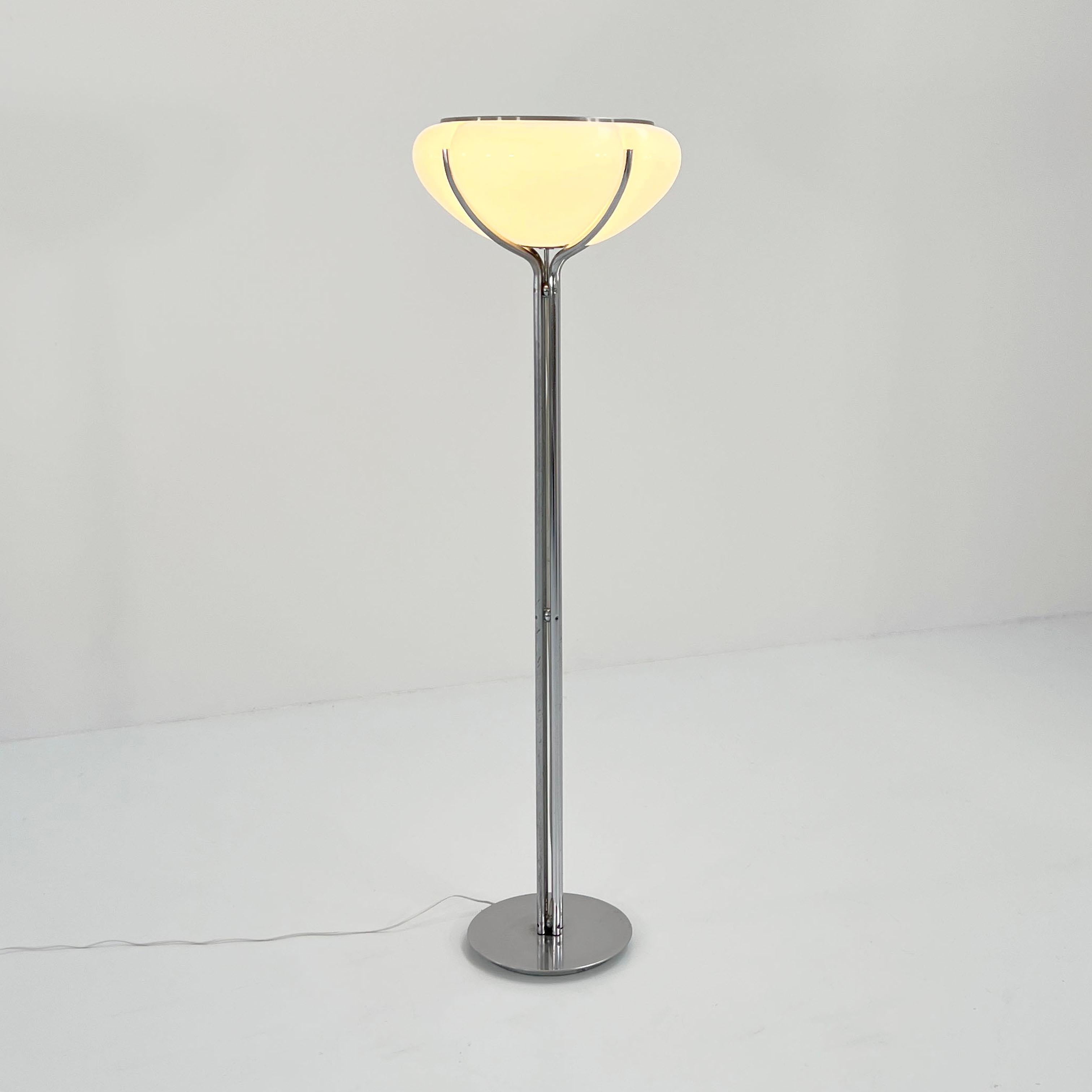 Producer - Harvey Guzzini
Model - Quadrifoglio Floor Lamp
Design Period - Seventies
Measurements - Width 54 cm x Depth 54 cm x Height 165 cm 
Materials - Metal, Plastic
Color - Silver, White
Comments - Light wear consistent with age and use. The